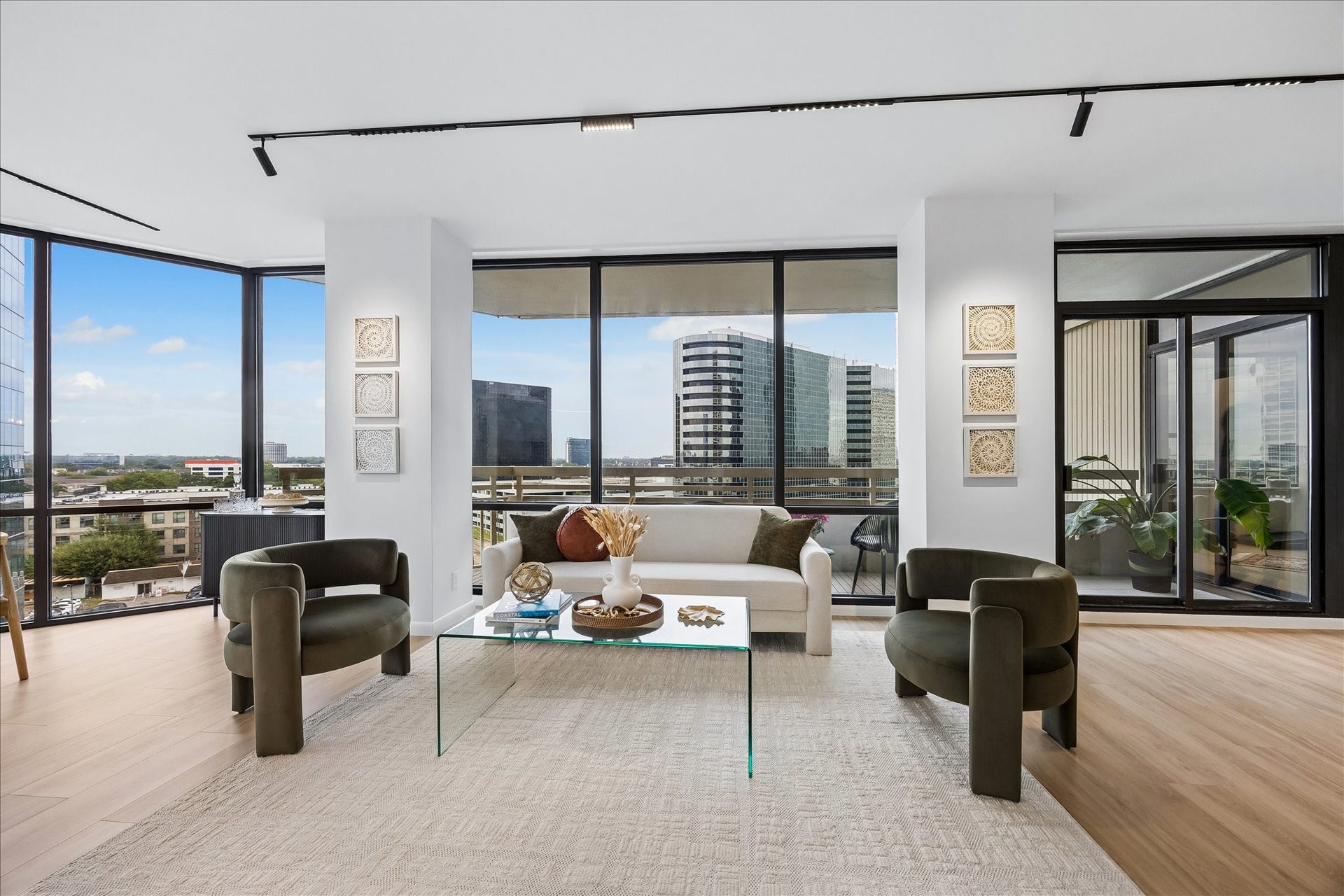 14 Greenway Plaza, #9R, Houston, TX 77046 Broad windows frame city views beside direct access to the covered balcony.