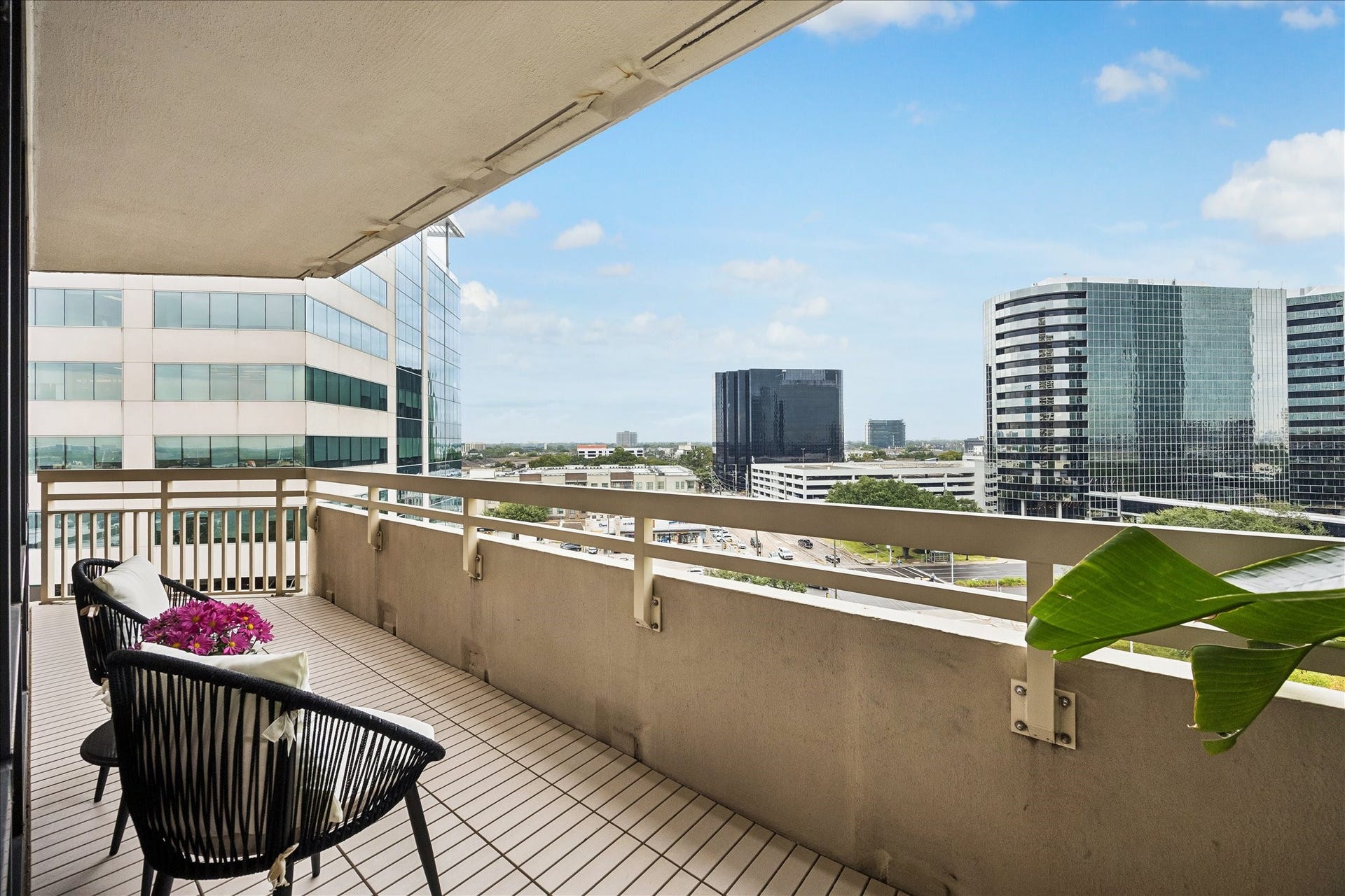 14 Greenway Plaza, #9R, Houston, TX 77046 Covered balcony provides an outdoor extension of the living space with city views.