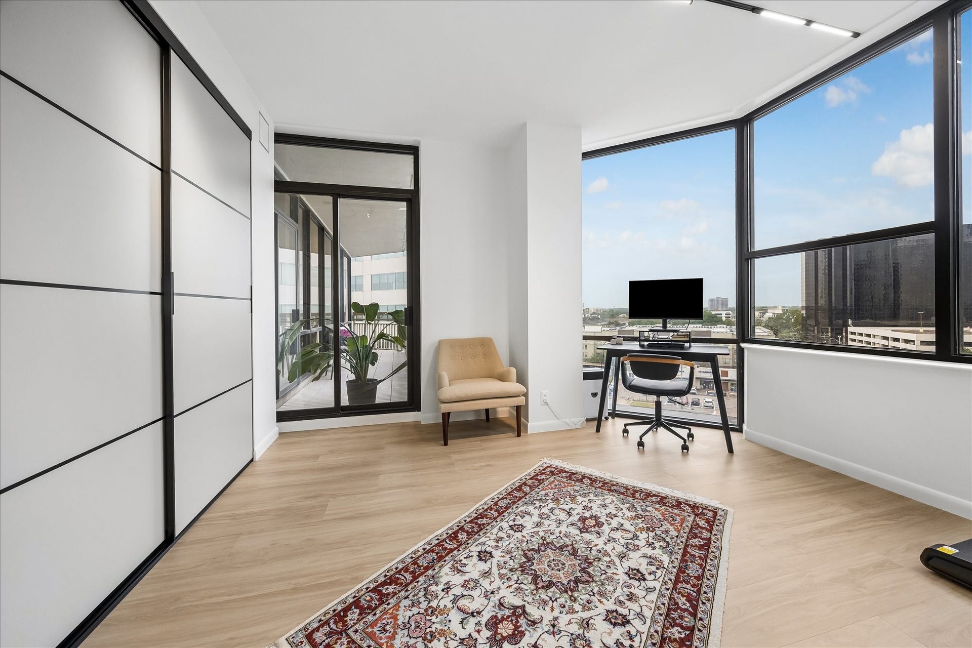14 Greenway Plaza, #9R, Houston, TX 77046 Sliding closet doors and a balcony entrance add storage and outdoor access to the flexible bedroom.