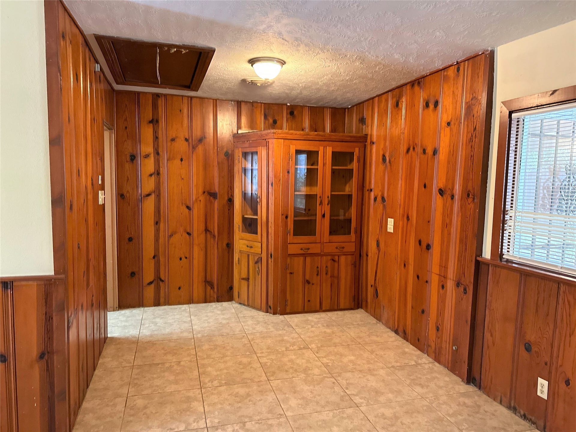 Breakfast area off of kitchen and connected to formal dining room.