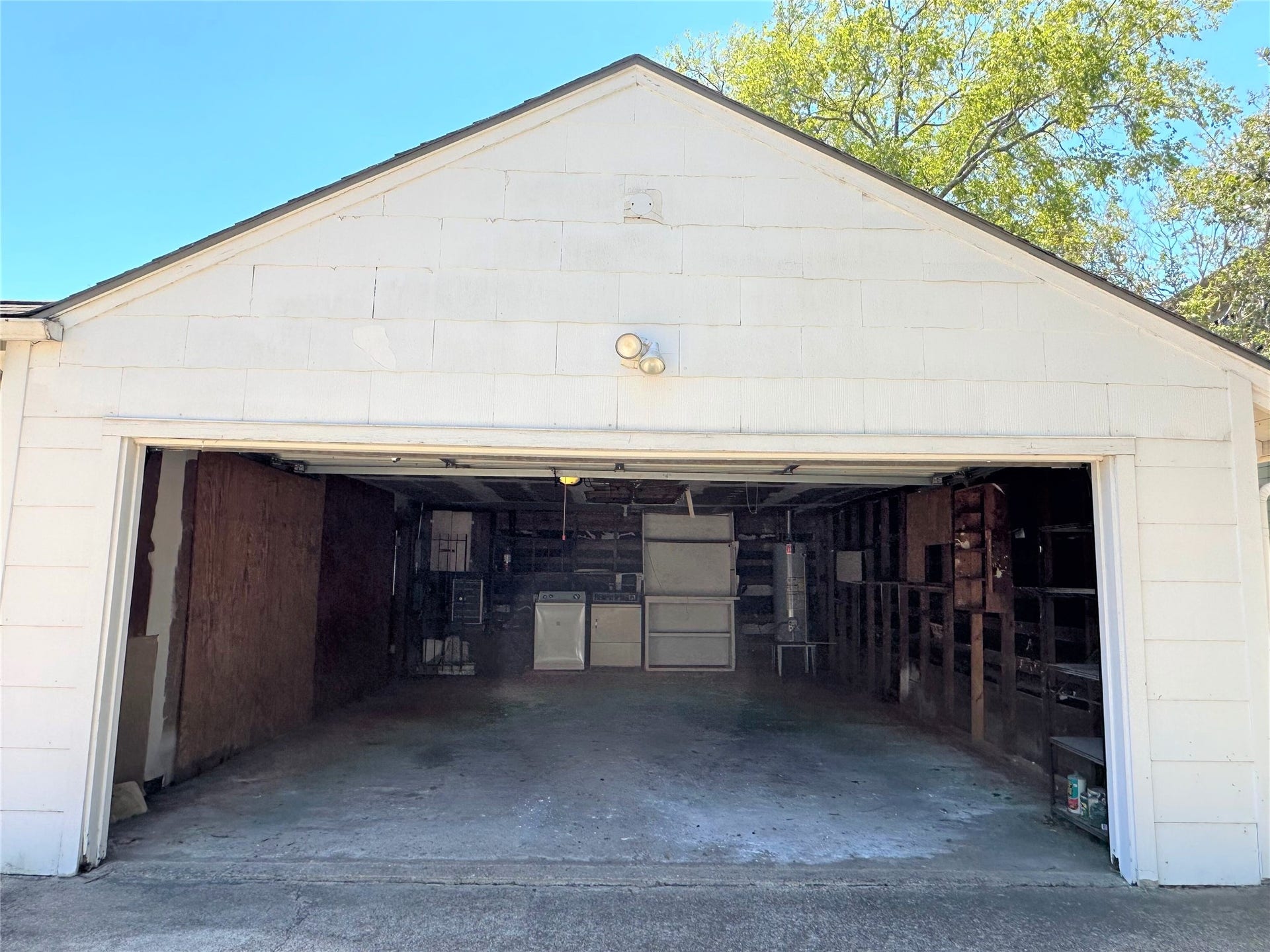 2-car garage with automatic garage door opener.  Extension on back side for storage and laundry area.