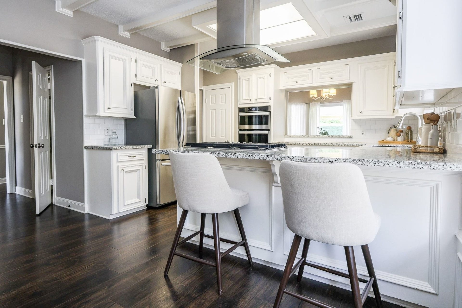 118 Mill Trail Drive, Sugar Land, TX 77498 Kitchen with gas range and overhead vent.