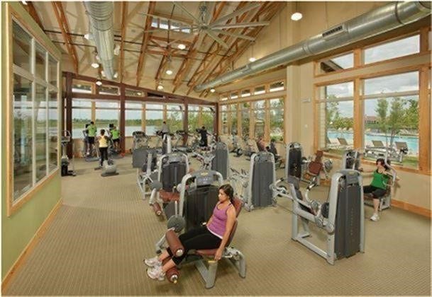 5219 Kenton Place Lane, Fulshear, TX 77441 Included in your HOA dues is access to the 6,500 square foot fitness center with top of the line equipment and personal trainers onsite! Lovely water and pool views surround. Various exercise classes are also available. Great way to begin or end the day!