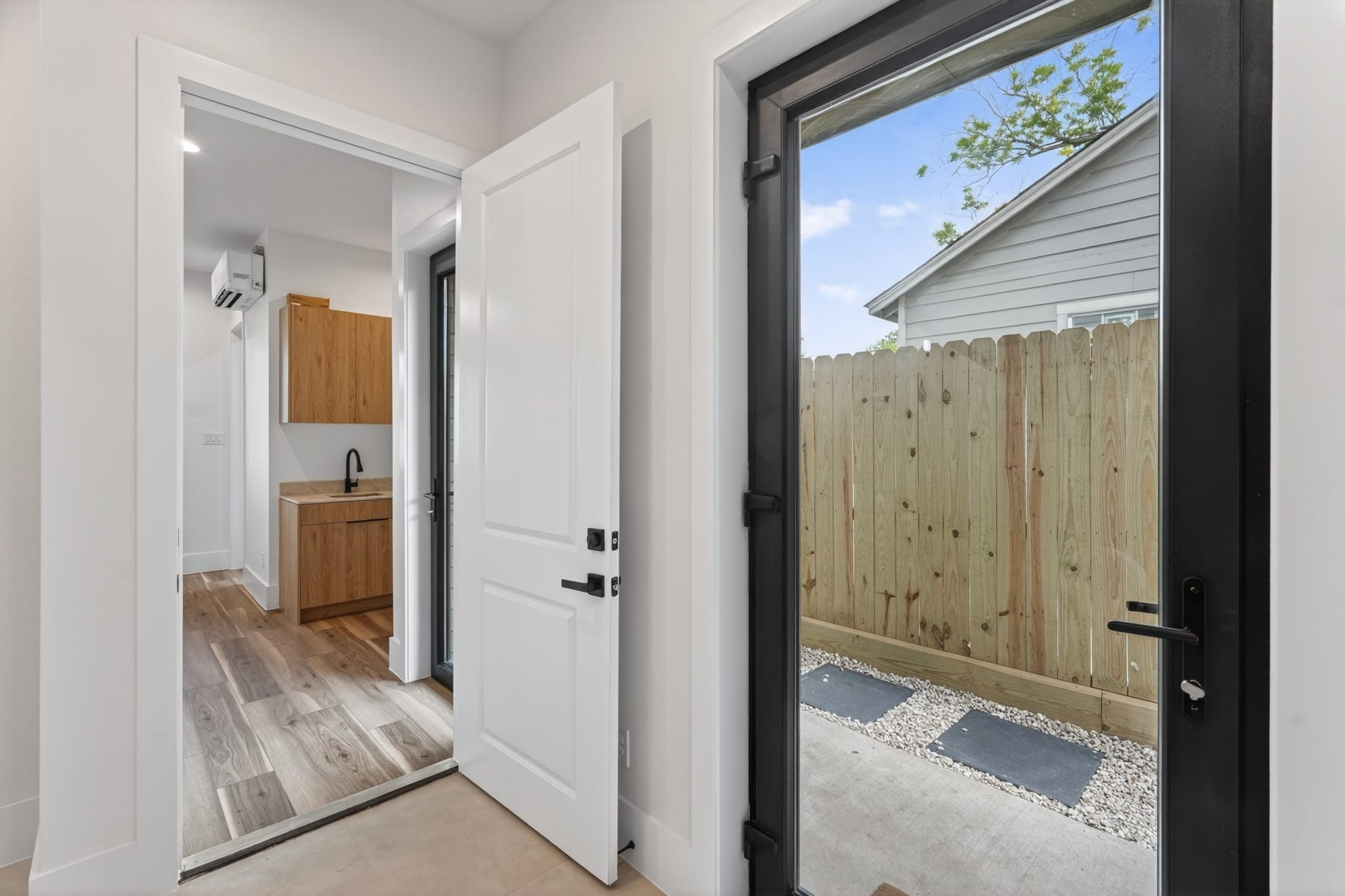 Private guest suite with its own exterior entrance and lockable access to the main home, offering flexibility for multigenerational living, visiting guests, or potential Airbnb use.