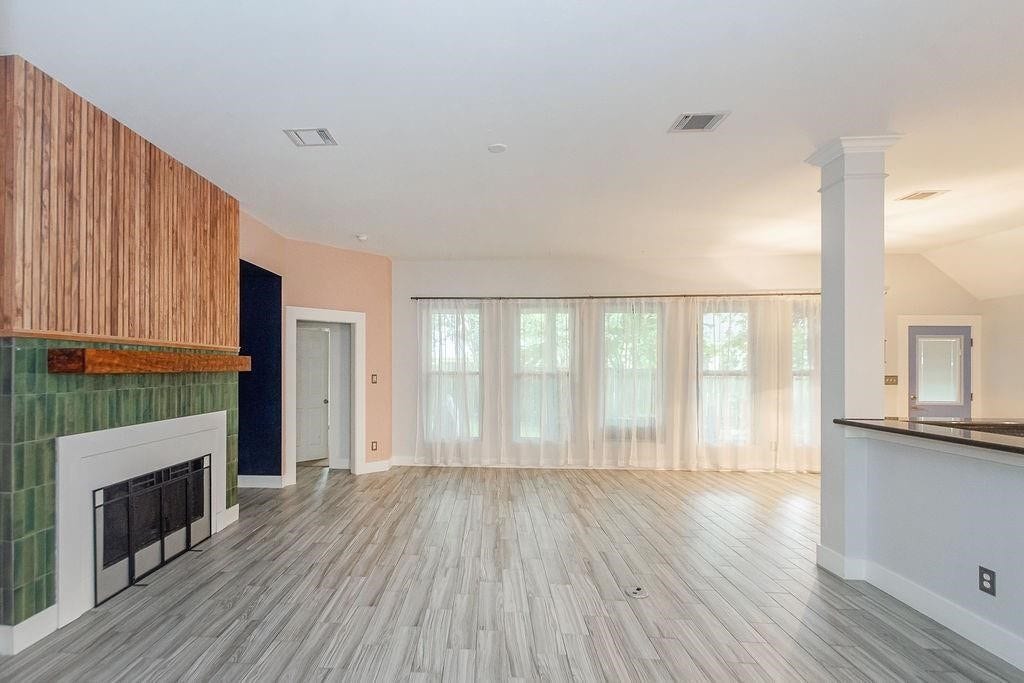 This room flows effortlessly into the kitchen. Large windows give this room a bunch of natural light