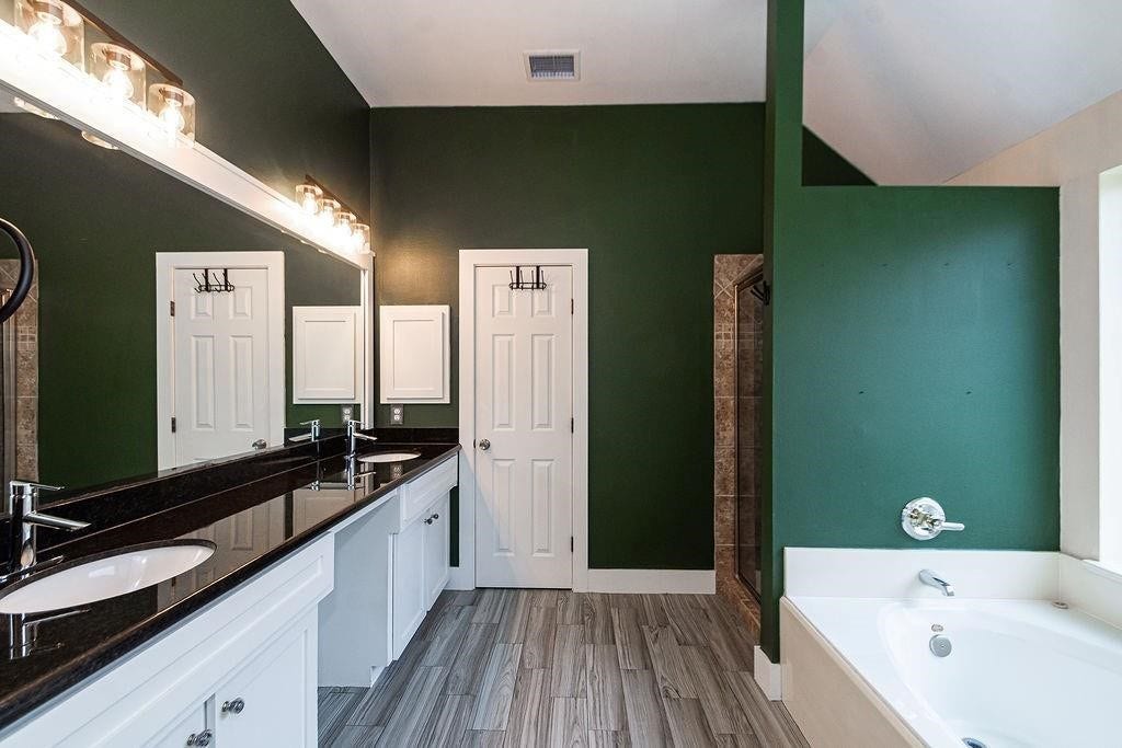 Great shot of the primary bathroom