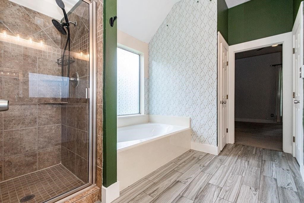 Large walk in shower and tub give this bathroom a lot of functional space