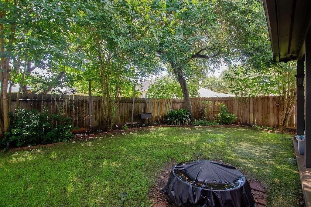 Large backyard with tons of shade is great for those hot days