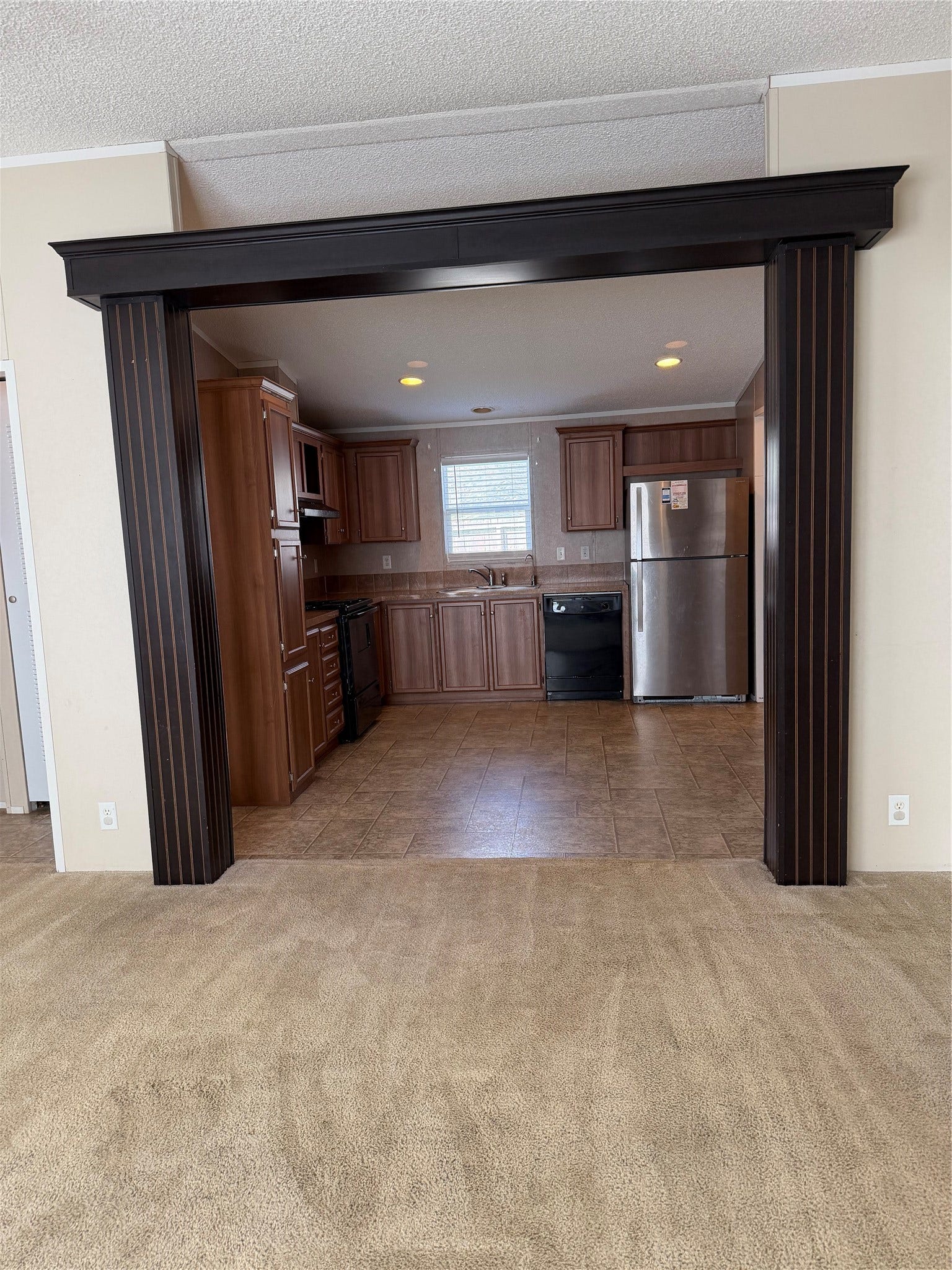 31816 Waller Tomball Rd 25, Waller, TX 77484 Bright and spacious living room with an open floor plan, large windows, and plenty of room for gathering with family and friends.