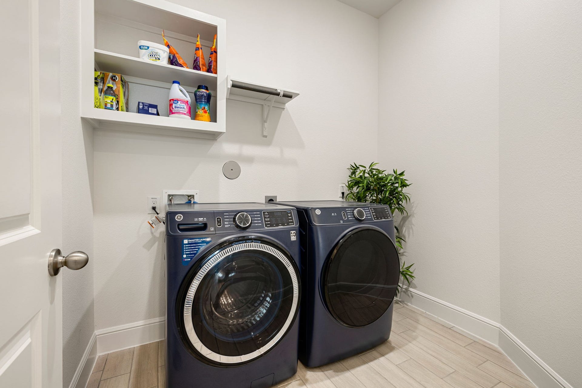 6903 Shoreline View Drive, Katy, TX 77493 Laundry room with front-loading washer and dryer that both STAY!