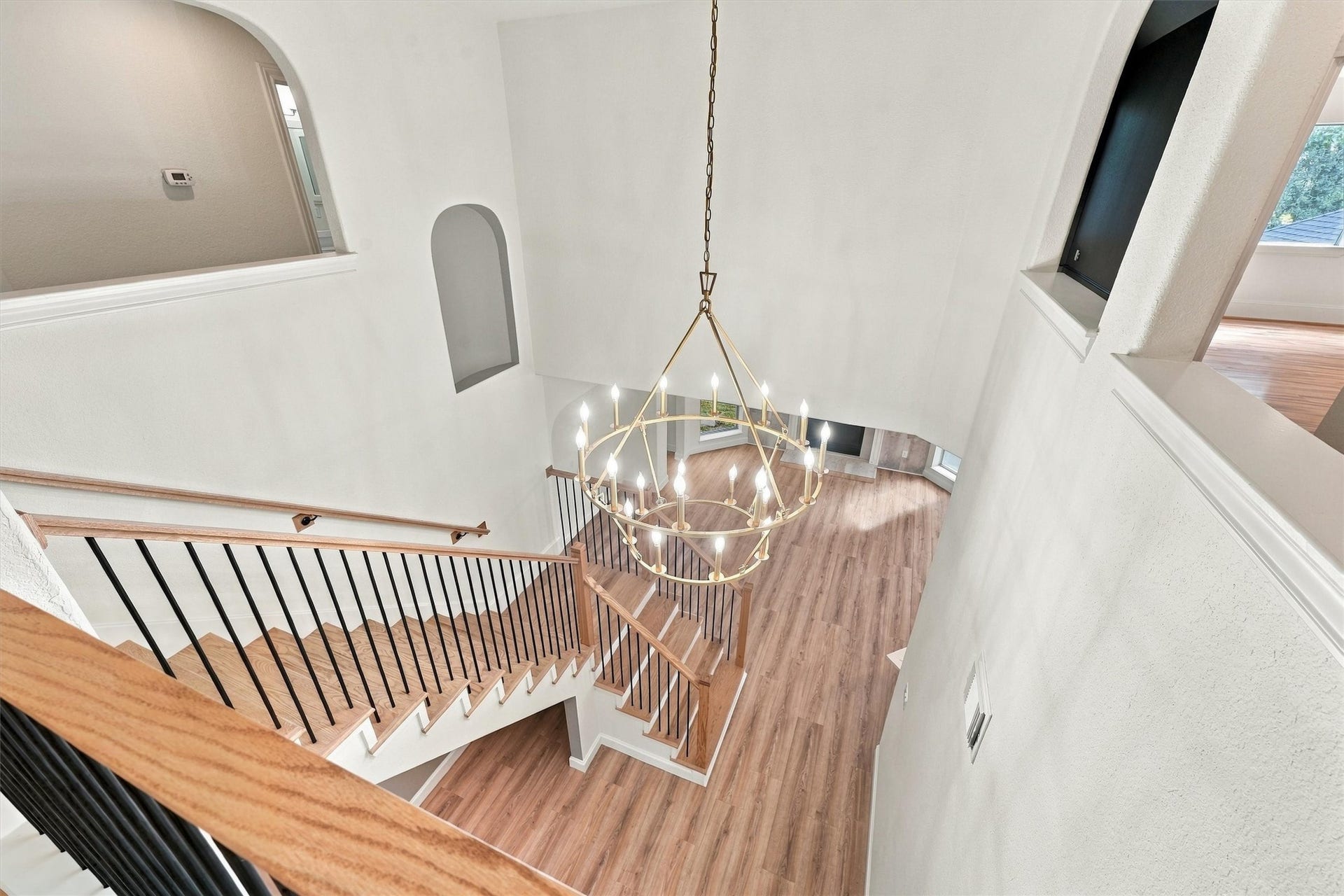 22415 Elizabeth Place Court, Katy, TX 77494 Iron and wooden staircase leading to upstairs