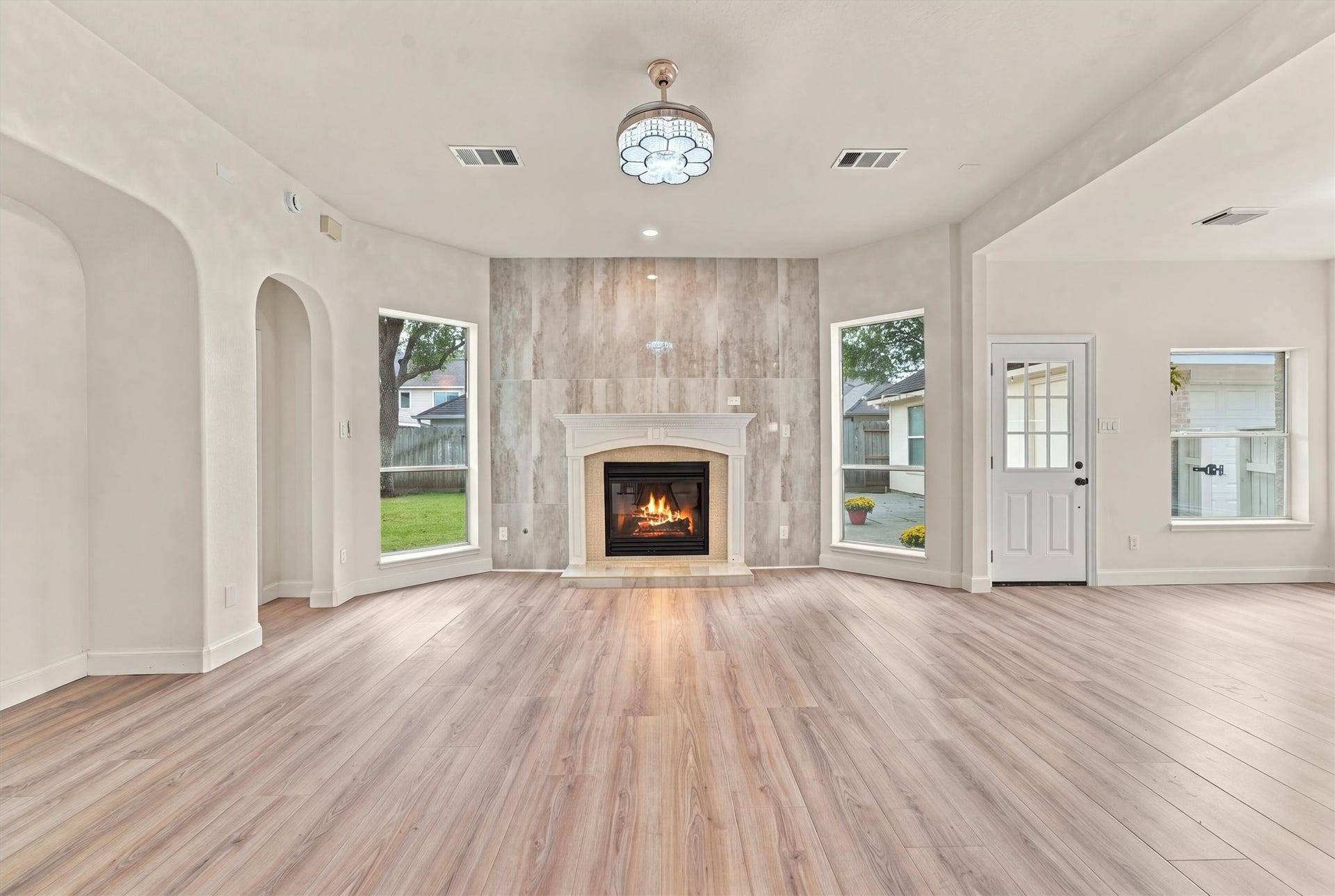 22415 Elizabeth Place Court, Katy, TX 77494 Mosaics around fireplace and decorative wall tile.