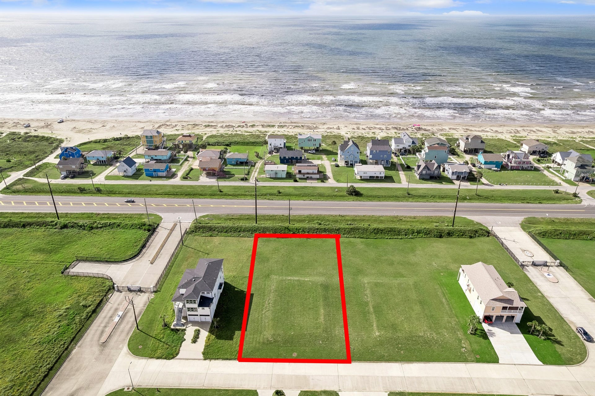 21205 Scissor Tail Lane, Galveston, TX 77554 Positioned in Sunset Cove, this cleared homesite is outlined for easy reference, offering a strong build site with the Gulf just across the road.