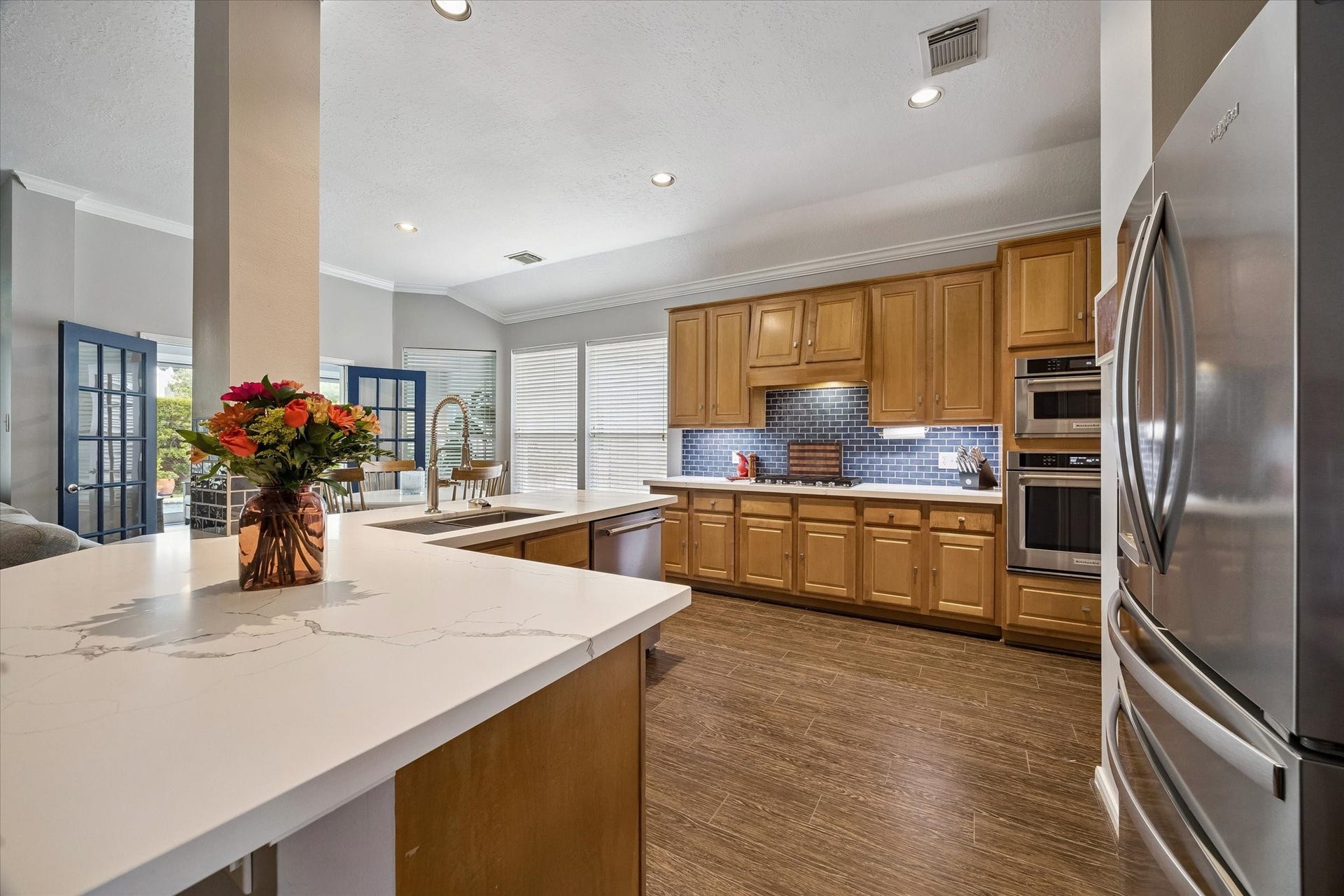 11615 Agate Canyon Lane, Houston, TX 77095 The kitchen offers plenty of storage, prep and cooking space.