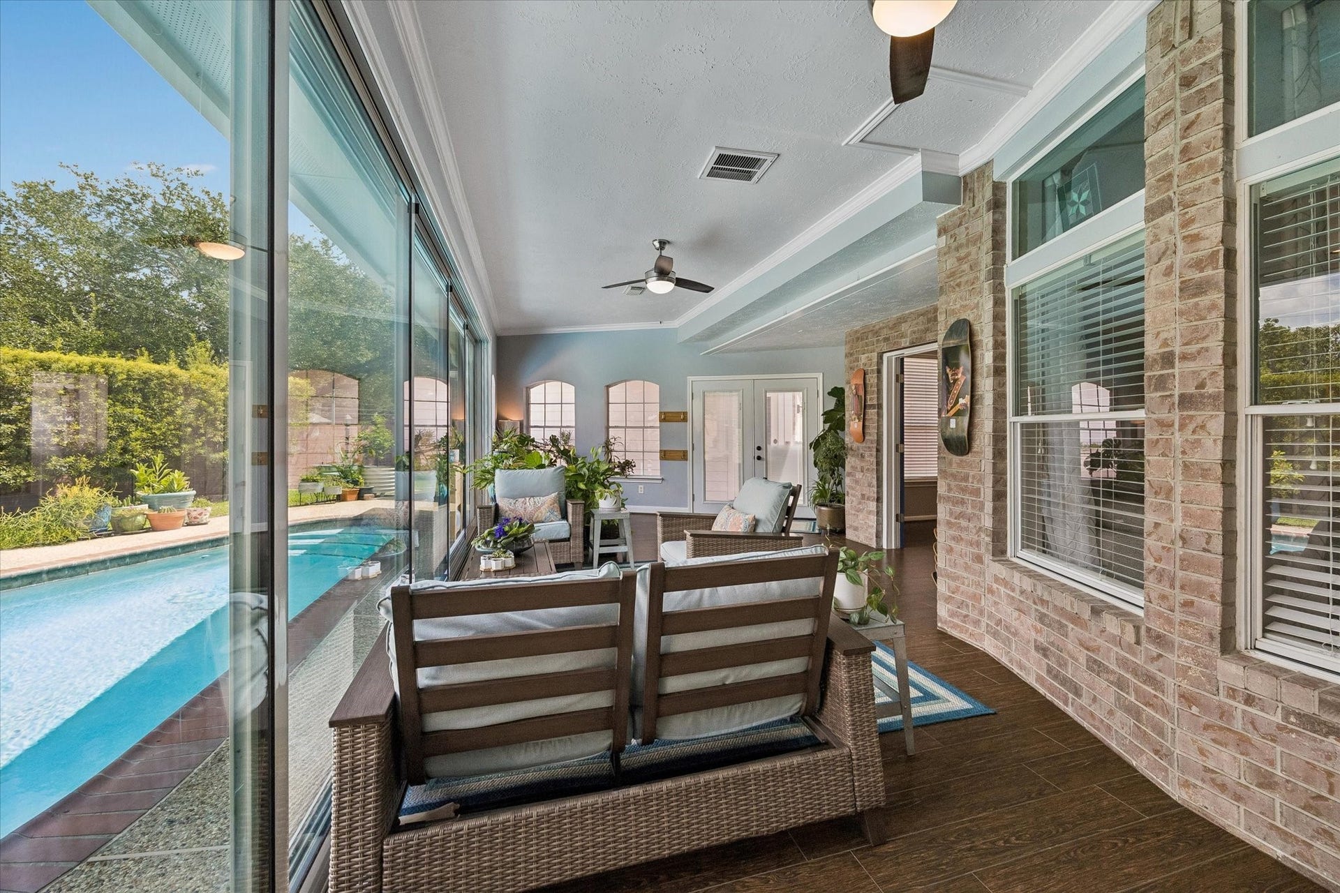 11615 Agate Canyon Lane, Houston, TX 77095 Another view of the sun room and the custom sliding glass wall.