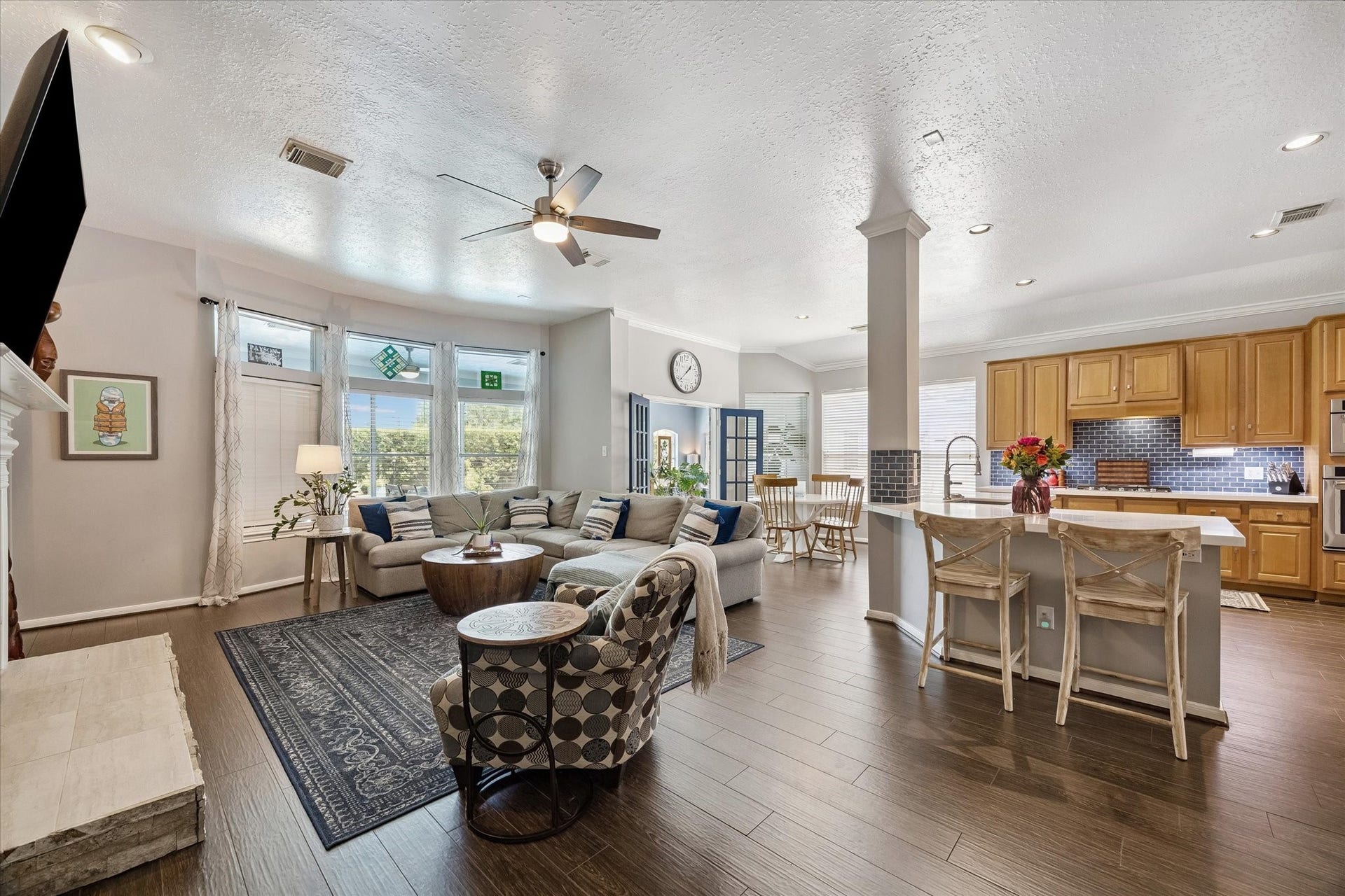 11615 Agate Canyon Lane, Houston, TX 77095 The home features an open-concept, kitchen-living room combo.