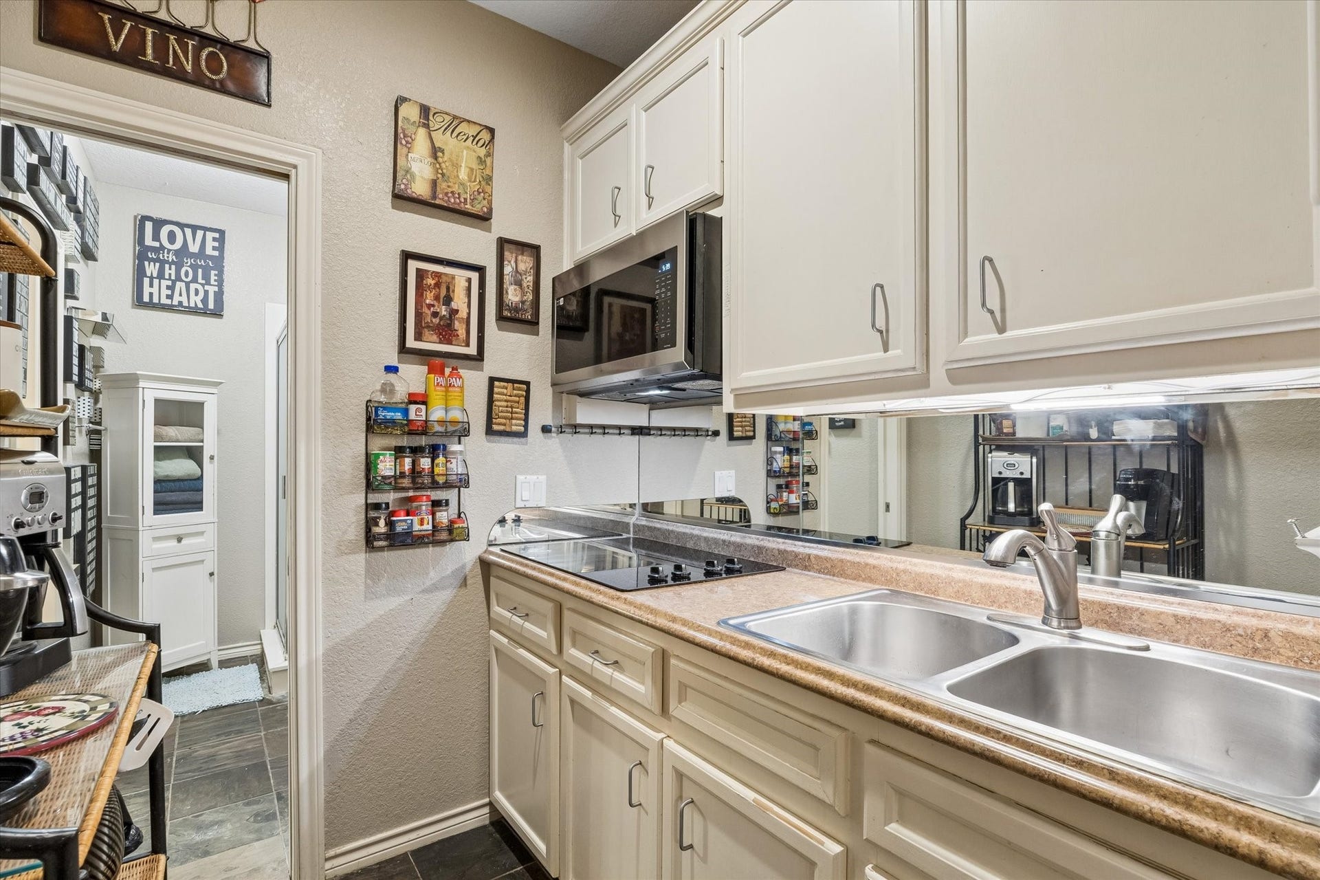 3040 Bayshore Drive, #3, Bacliff, TX 77518 Kitchenette featuring sink, convection microwave oven, cook top and refrigerator.