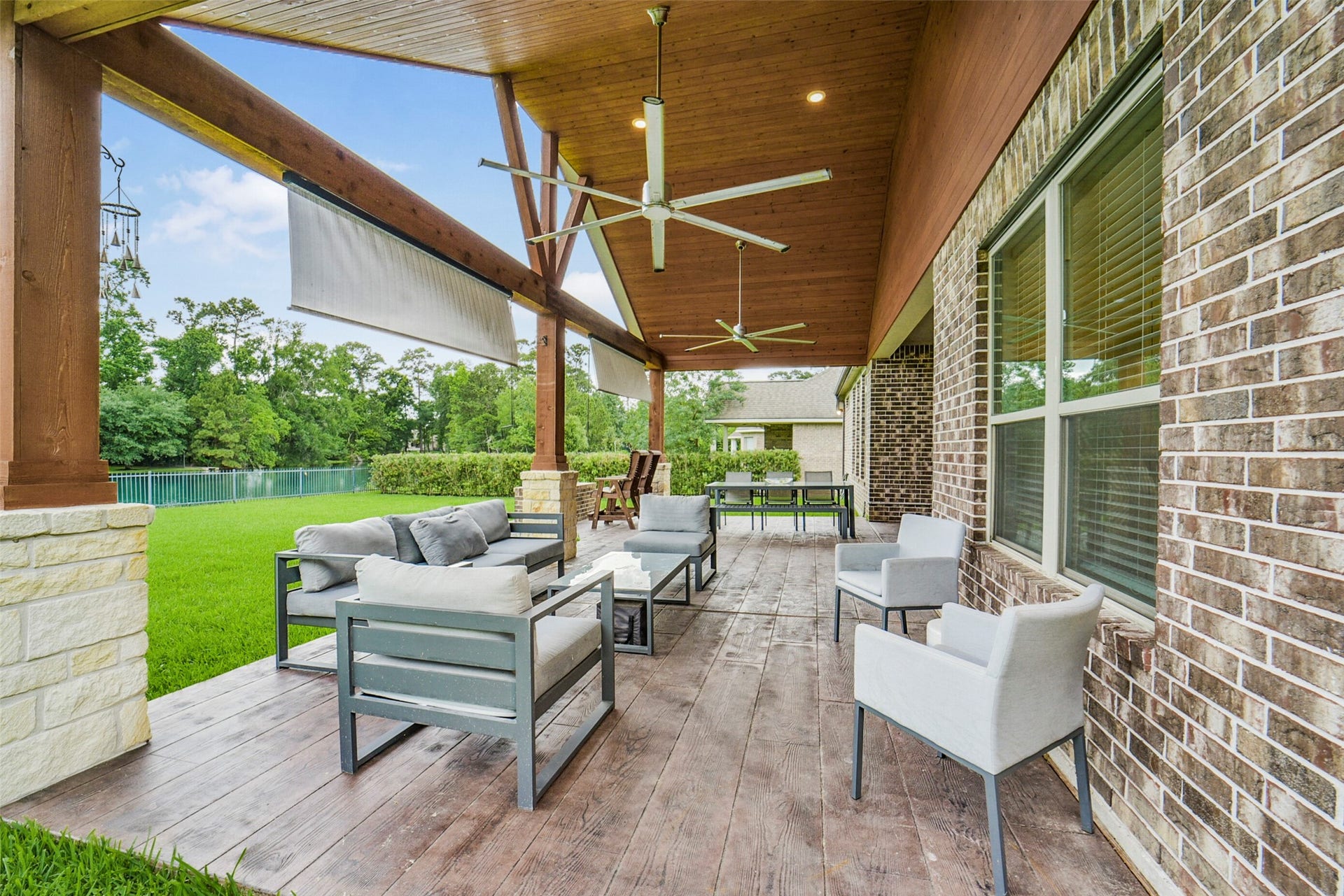 21011 Atascocita Point Drive, Humble, TX 77346 Extended covered patio with stamped concrete