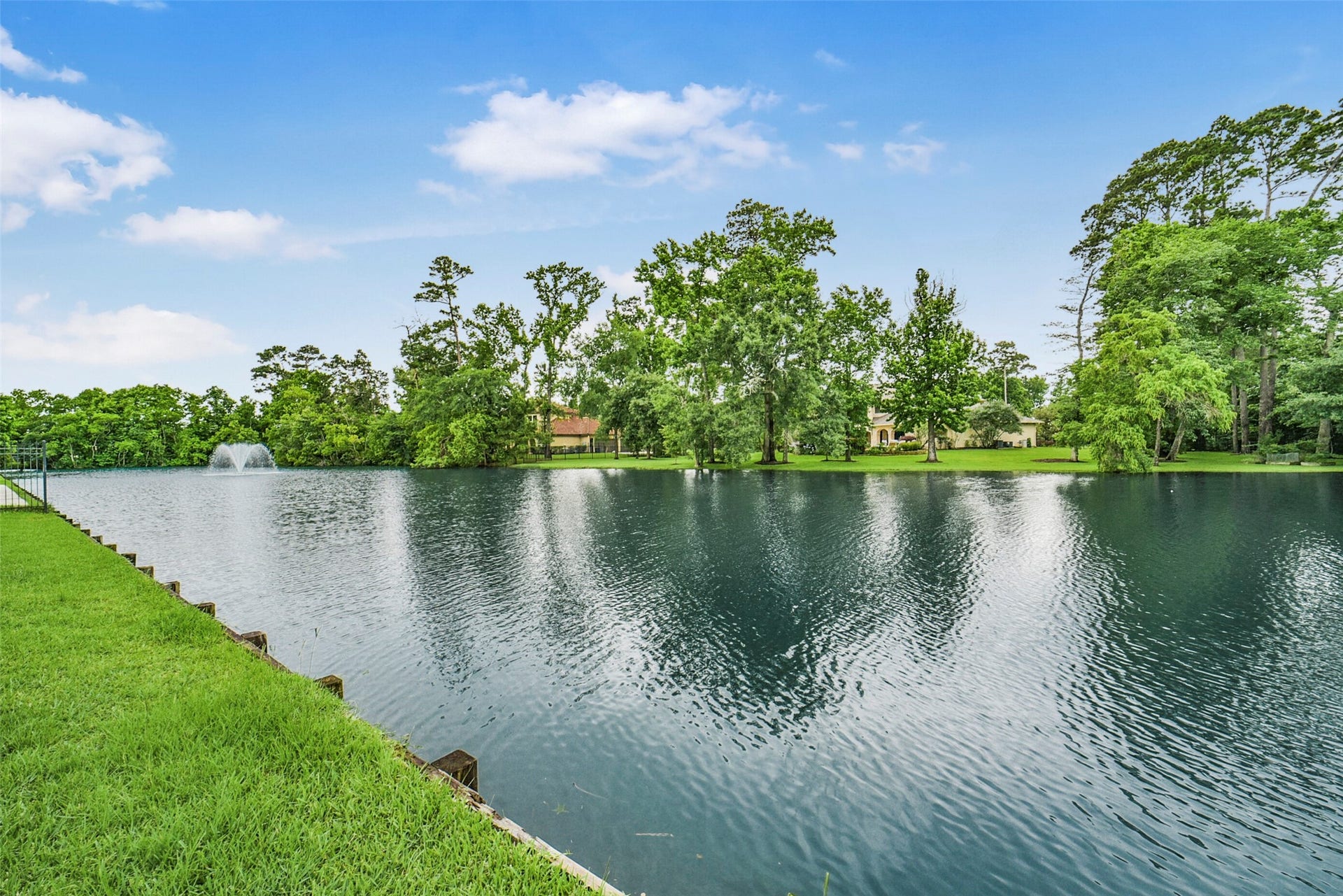 21011 Atascocita Point Drive, Humble, TX 77346 Beautiful pond with a fountain
