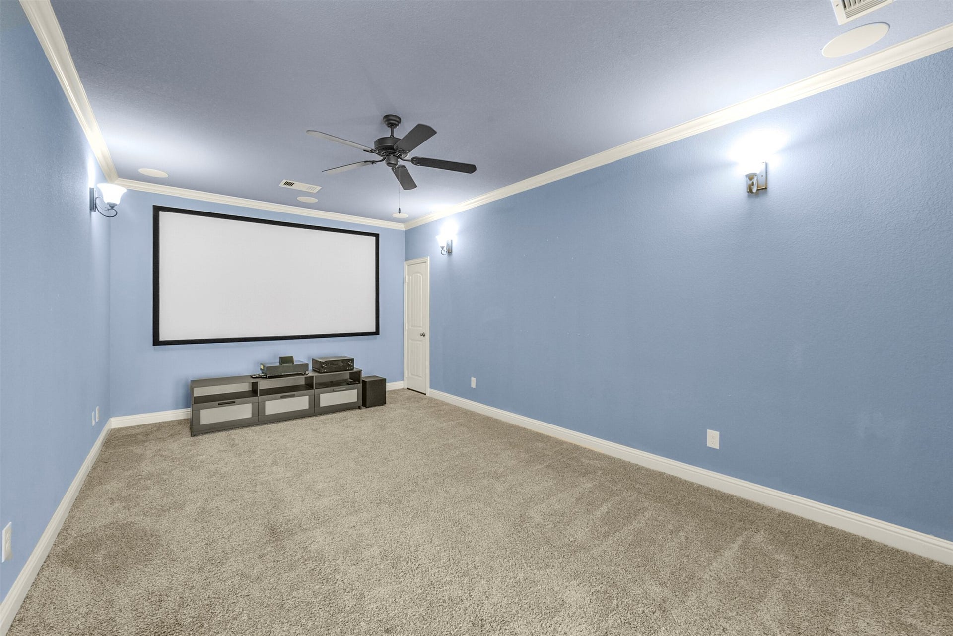 21011 Atascocita Point Drive, Humble, TX 77346 Enjoy a movie or sporting event in this media room. Screen will stay.