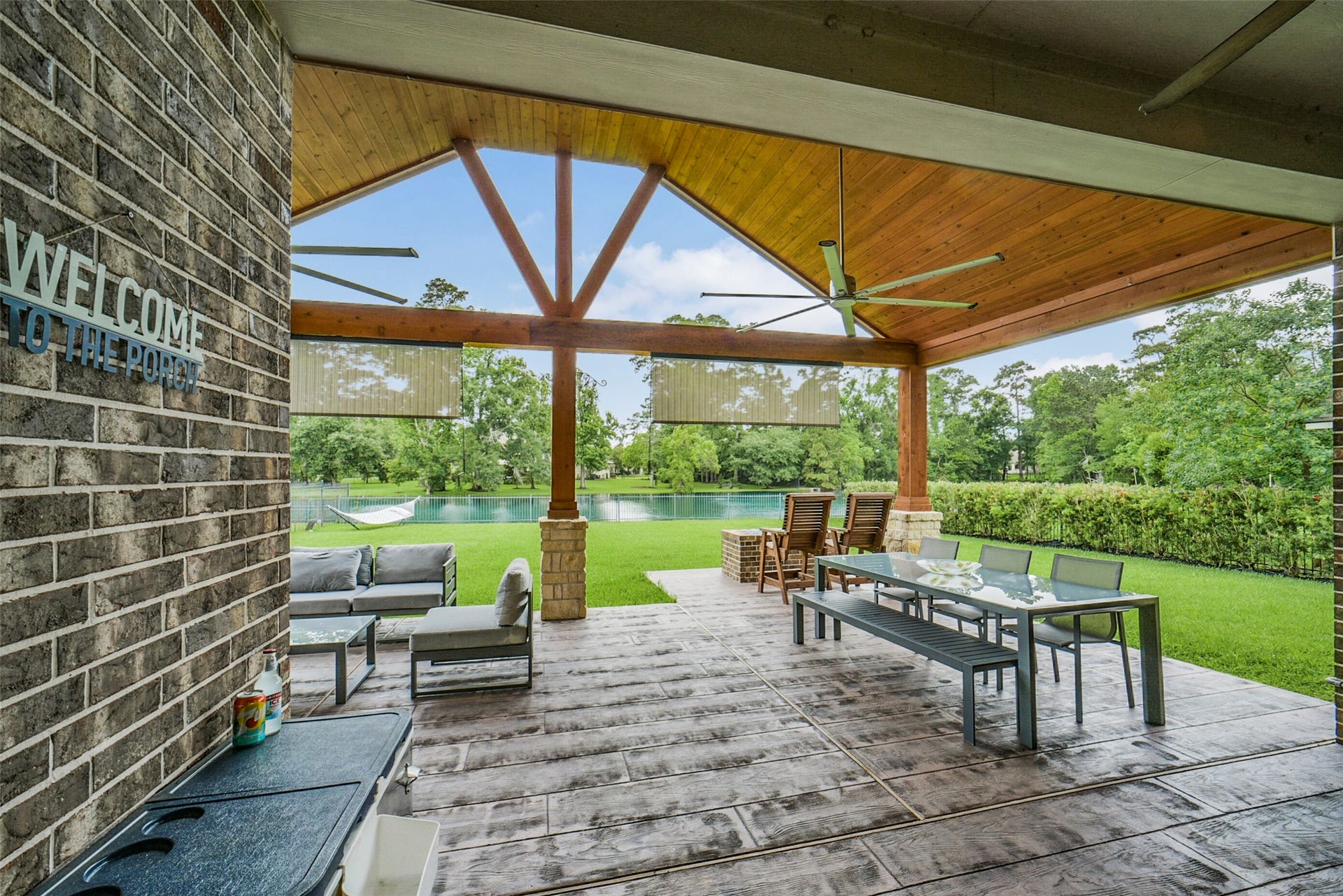21011 Atascocita Point Drive, Humble, TX 77346 Beautifull designed for relaxing and entertainment. 2 large fans, retractable shades and a gas firepit.
