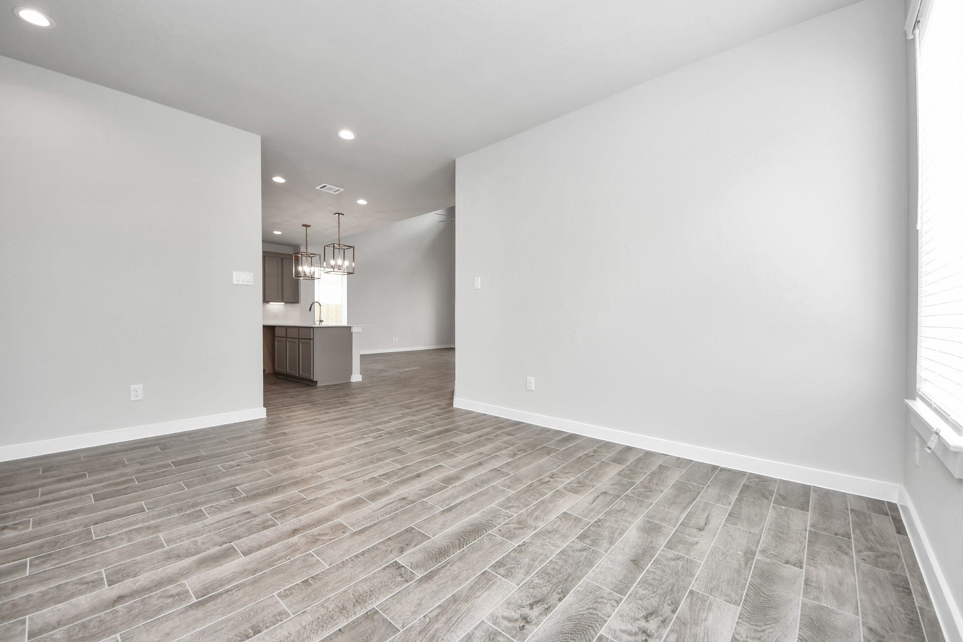 15315 Geranium Field Drive, Houston, TX 77044 Take another look at the spacious dining area! Sample photo of completed home with similar floor plan. Actual colors and selections may vary.