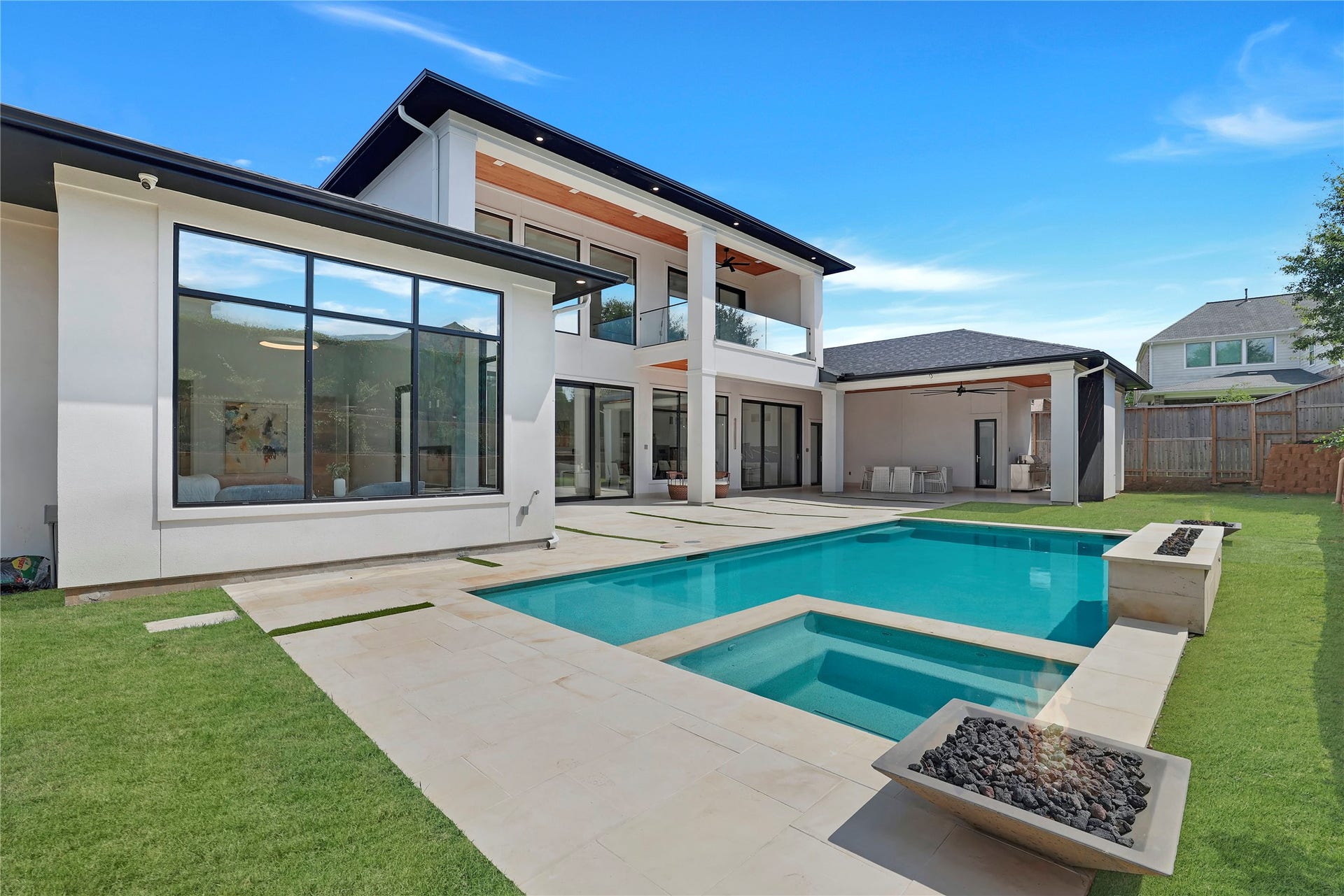 Your own private oasis, tucked away from the rest of the world. This beautifully appointed backyard features a sparkling 5-foot deep gunite pool and spa, an inviting retreat for quiet mornings, afternoon swims and evenings spent unwinding under the stars. A resort-like escape, without ever leaving home.