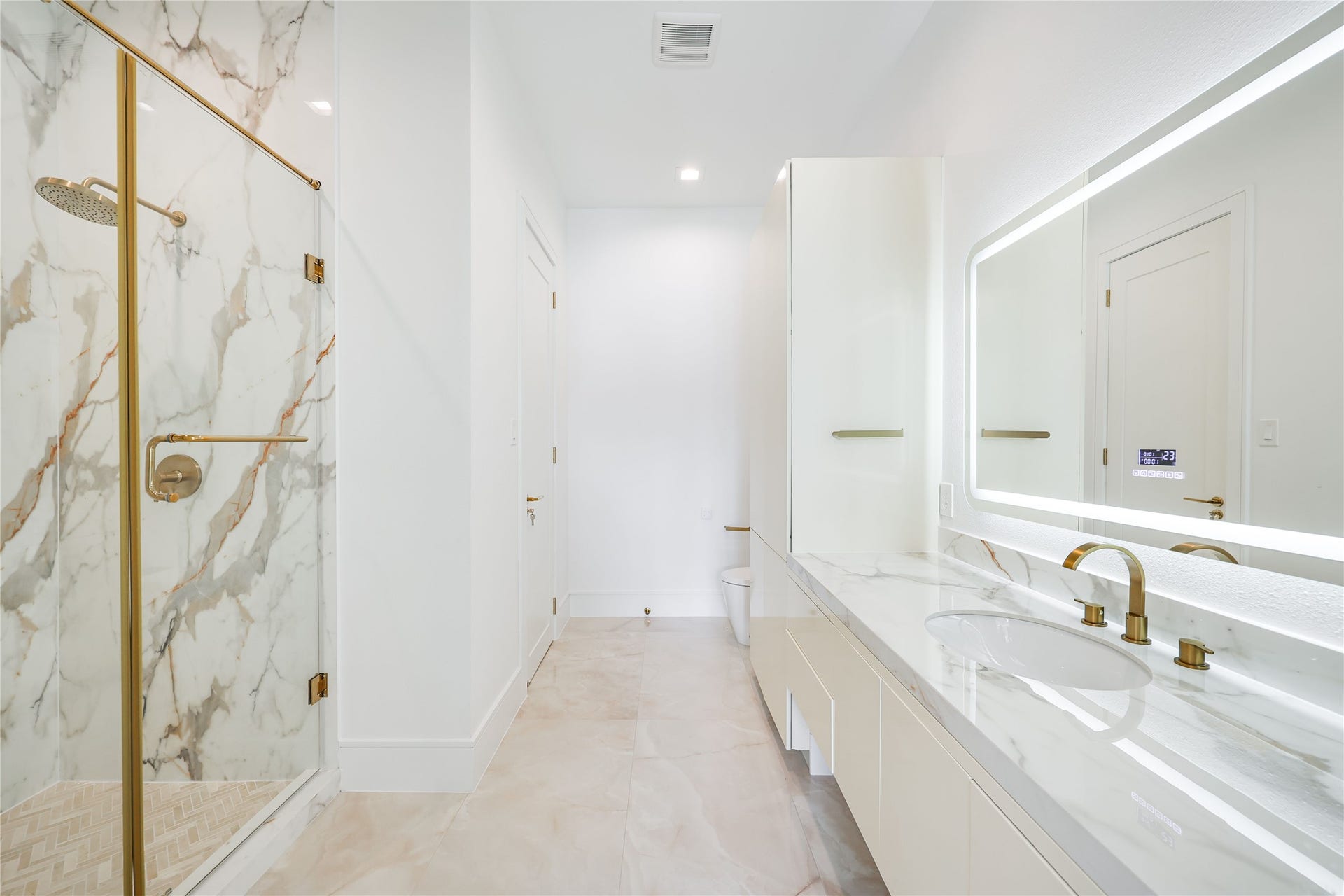 This is the private en-suite bathroom to this third bedroom, featuring elevated finishes and a refined sense of luxury.