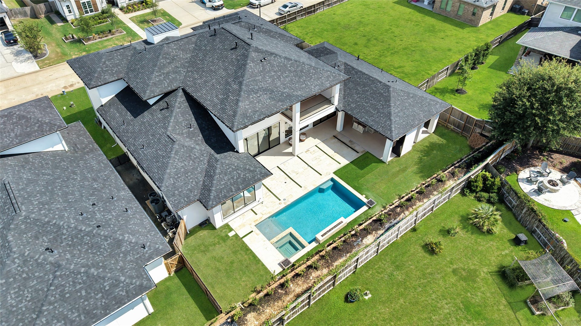 The aerial perspective says it all. Expansive, private and designed for resort-style living with a pool, spa, beautifully terraced grounds and room to truly spread out.