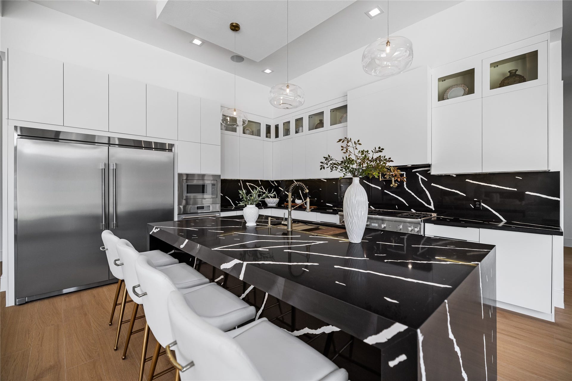 All commercial-grade Thermador appliances throughout this entire custom kitchen.