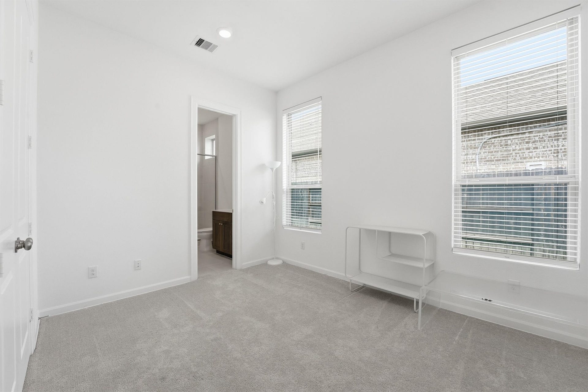 Private Secondary bedroom and bath create an ideal setup for guests or extended stays.