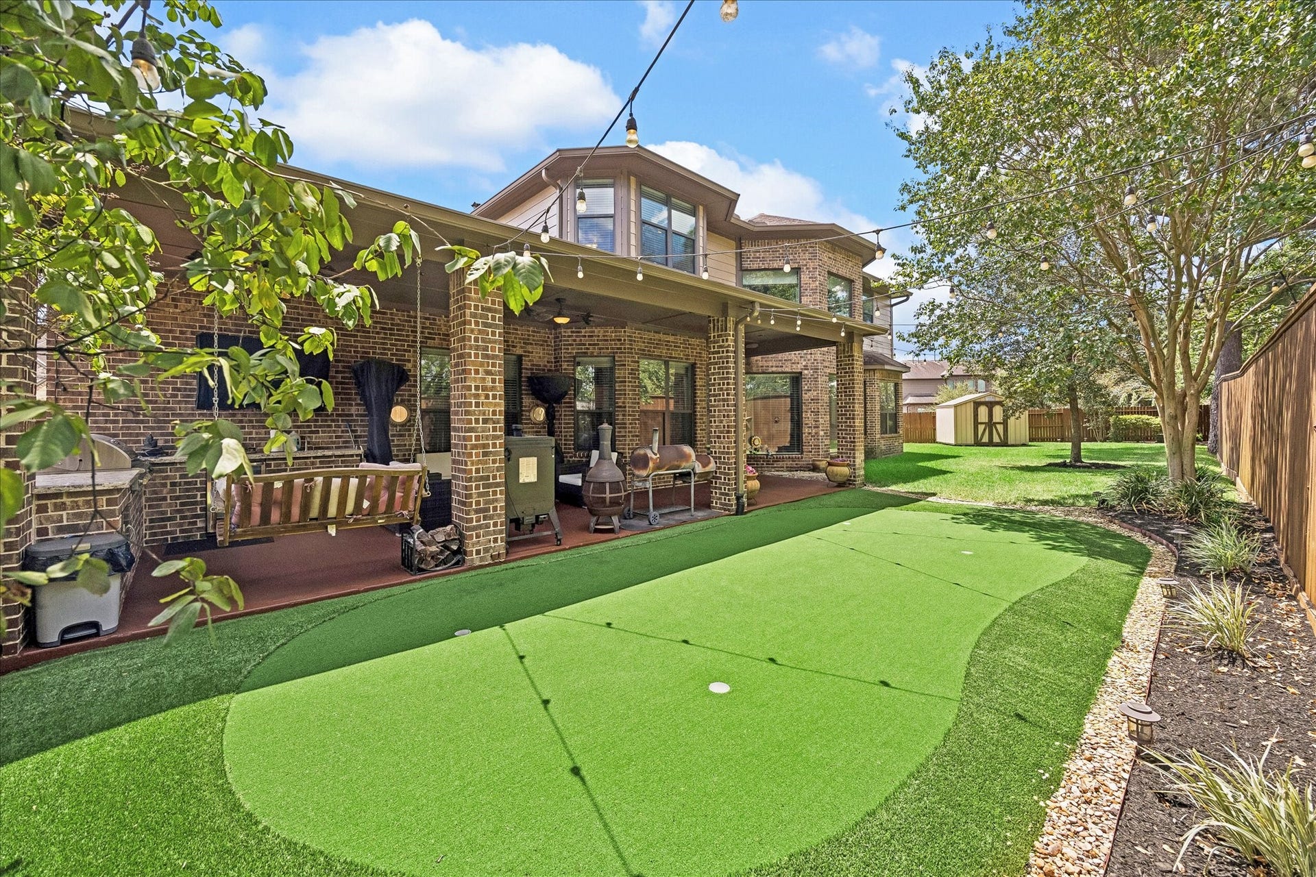 17427 Stonebrook Run Court, Tomball, TX 77375 Practice your short game without leaving home. The putting green gives the backyard something to do