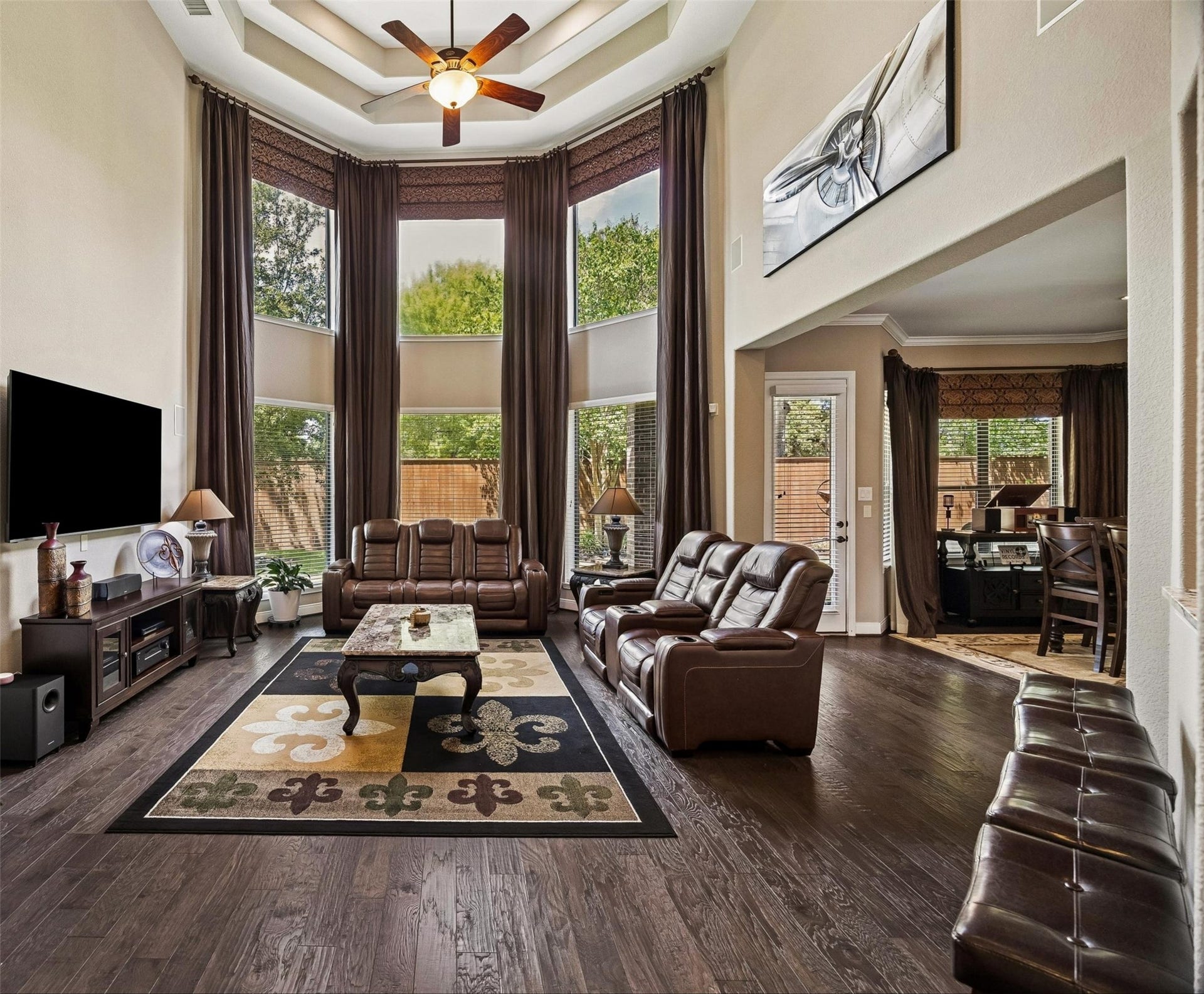 17427 Stonebrook Run Court, Tomball, TX 77375 The family room is designed for the part of the day when everyone comes back together. Its connection to the surrounding living spaces keeps conversation flowing, while the soaring ceiling gives the room a sense of openness that carries beyond its footprint.