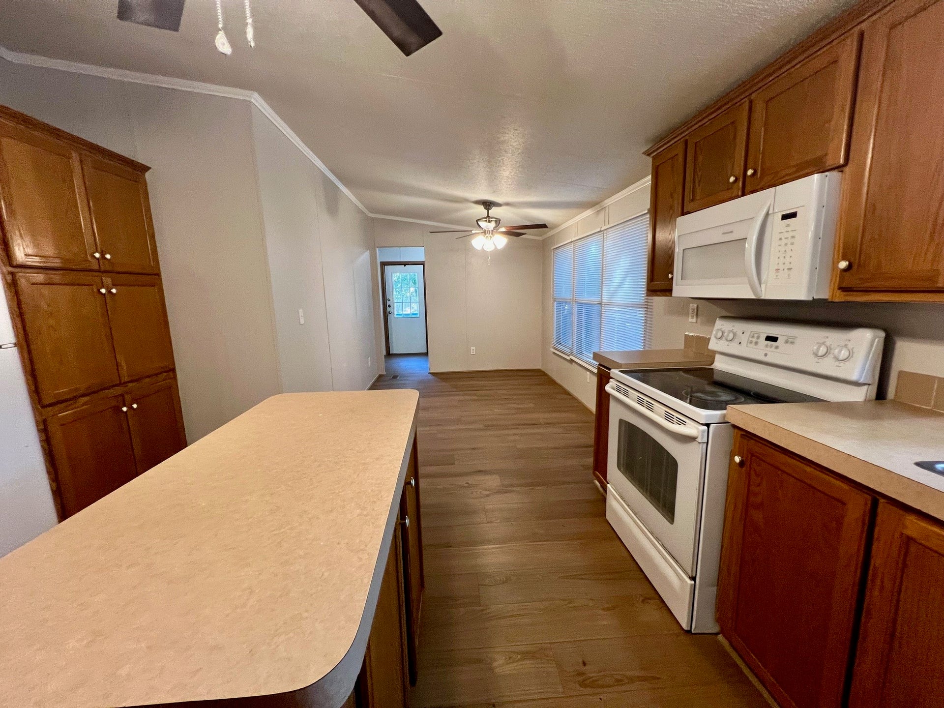16128 Lone Star Ranch Drive, Conroe, TX 77302 Kitchen with view of breakfast area.