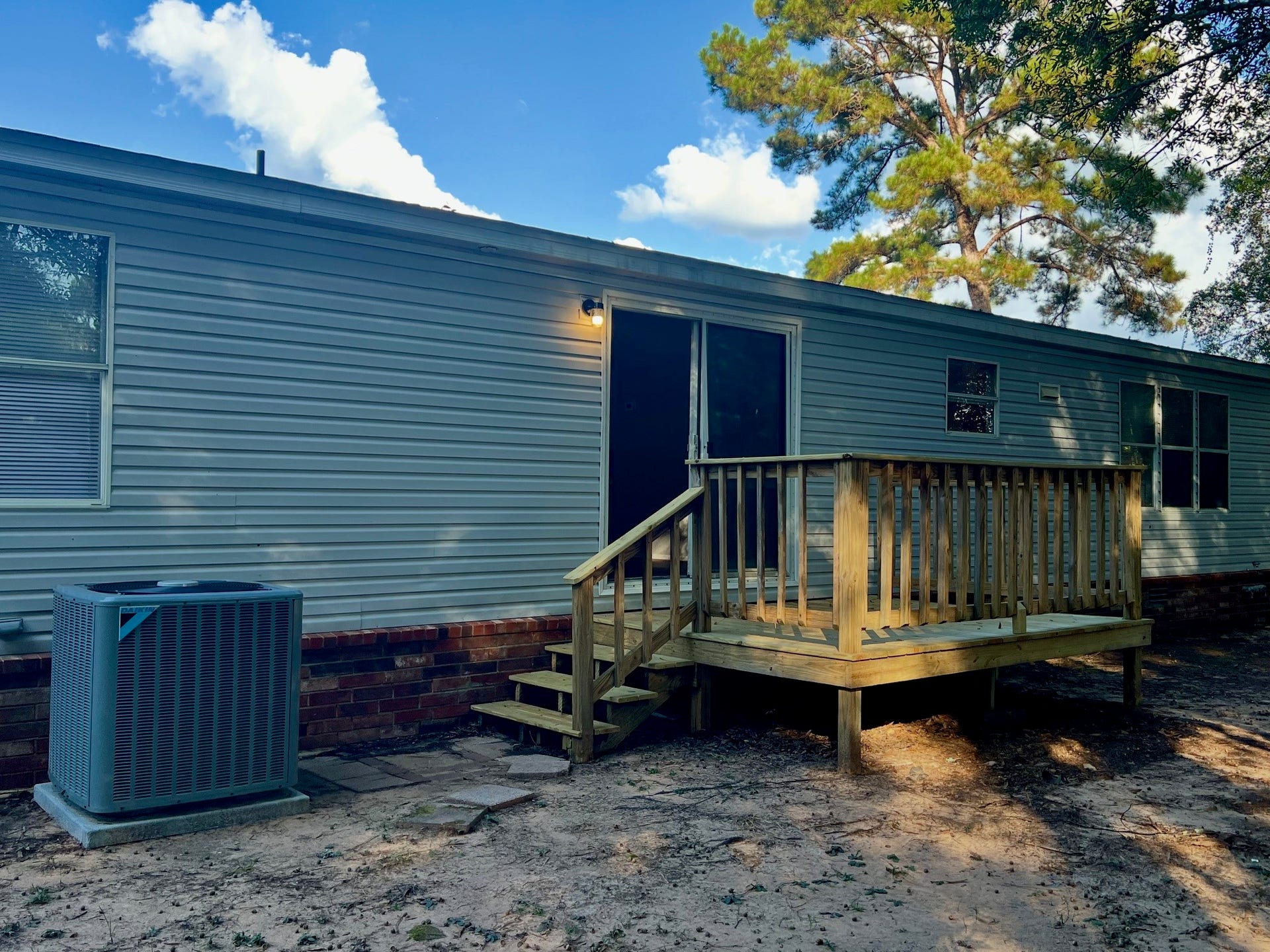 16128 Lone Star Ranch Drive, Conroe, TX 77302 Back yard with deck for enjoying the outdoors.