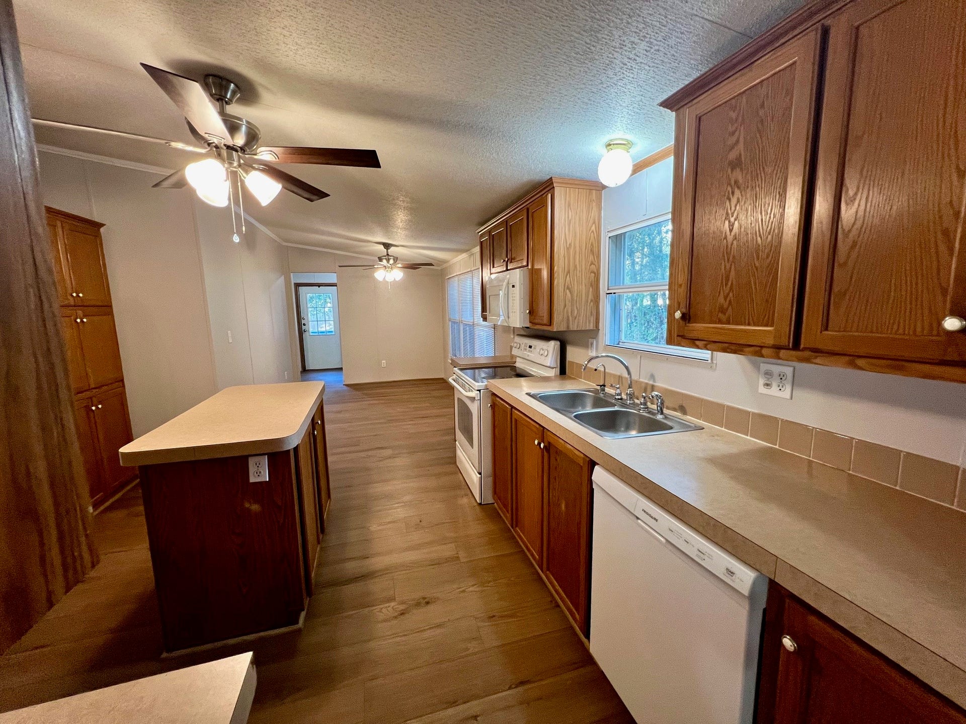 16128 Lone Star Ranch Drive, Conroe, TX 77302 Kitchen with new dishwasher.