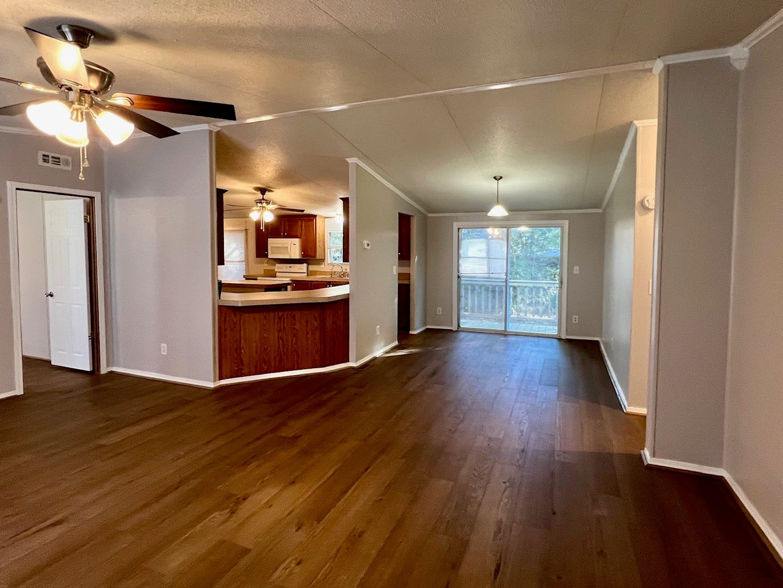 16128 Lone Star Ranch Drive, Conroe, TX 77302 Living room overlooking the kitchen.