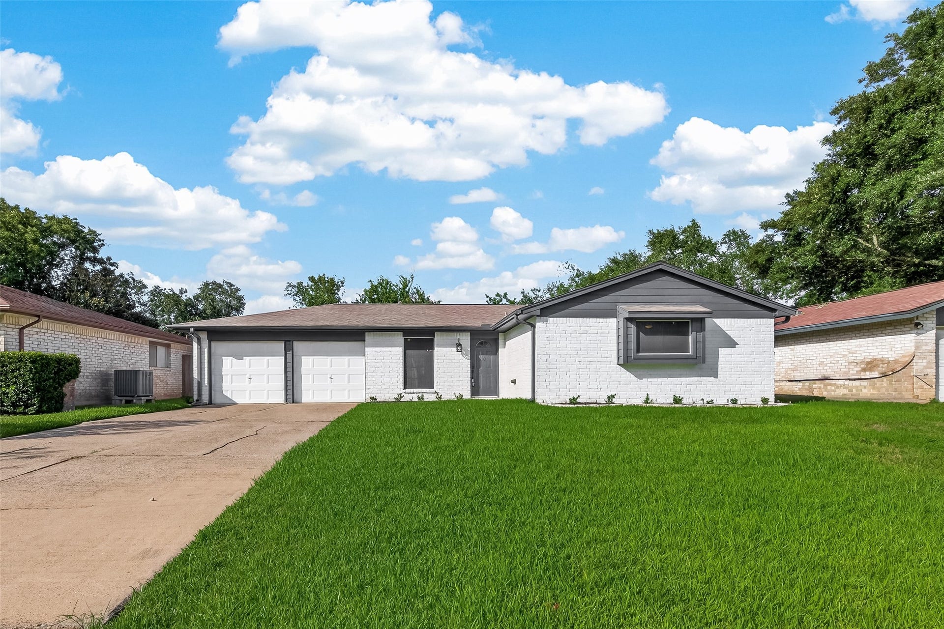 16619 Tibet Road, Friendswood, TX 77546 This is a charming single-story home with a well-maintained lawn, featuring a two-car garage and a clean exterior. The property is nestled in a quiet neighborhood, surrounded by mature trees, offering a peaceful atmosphere.