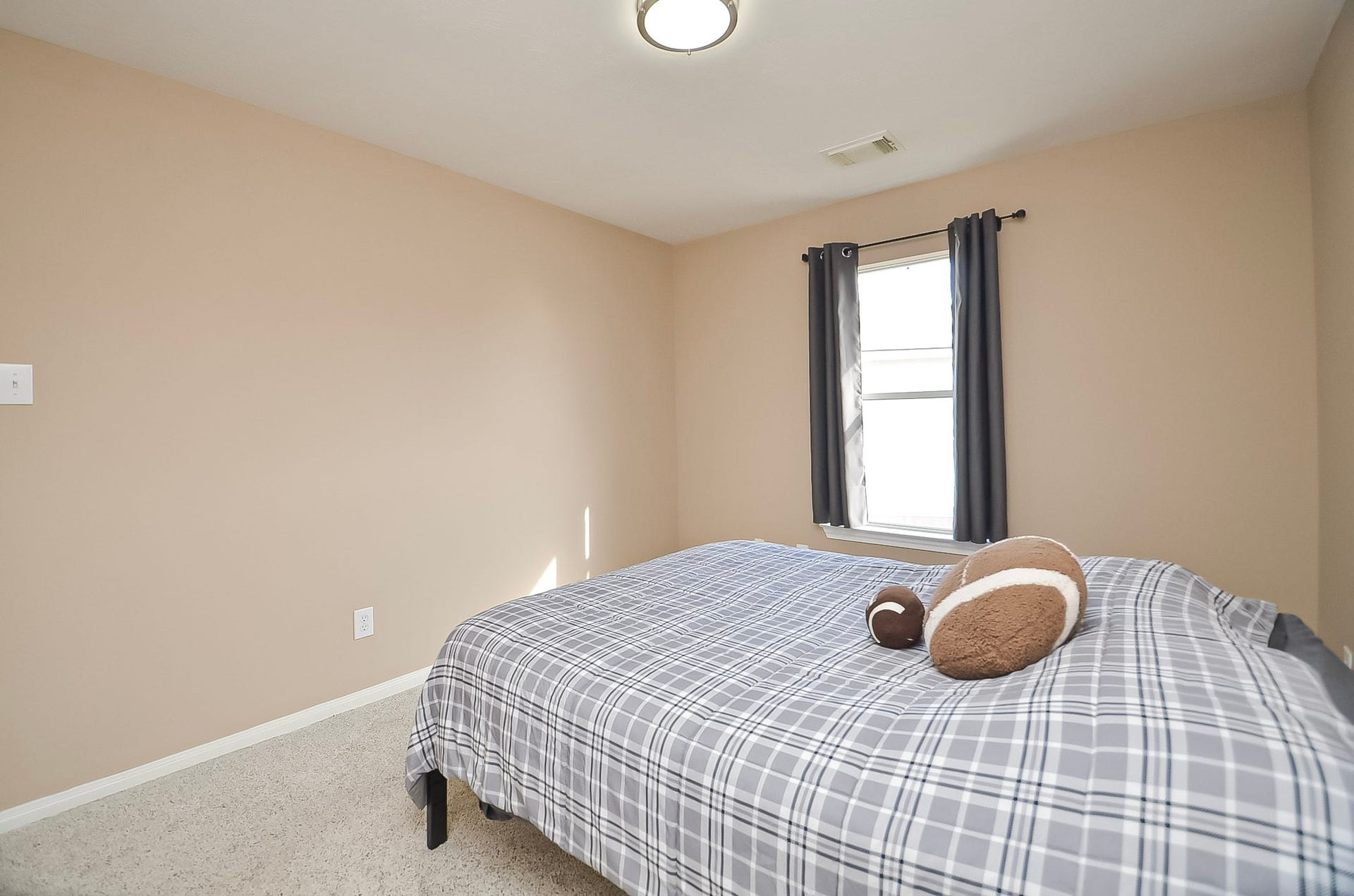 1727 Maryvale Drive, Katy, TX 77494 One of the upstairs two secondary bedrooms. Freshly painted.
