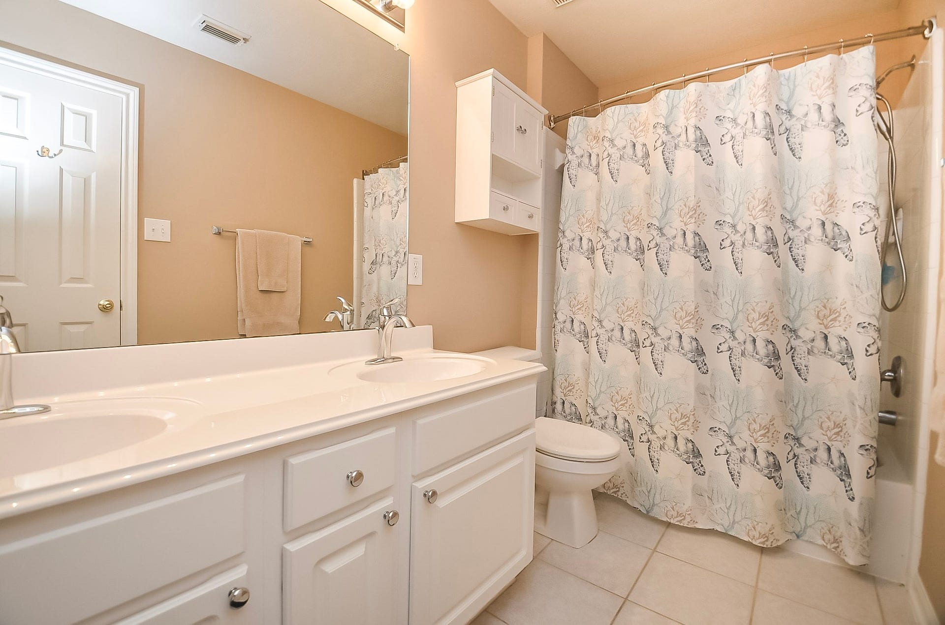 1727 Maryvale Drive, Katy, TX 77494 Upstairs bathroom with dual vanities. Freshly painted.