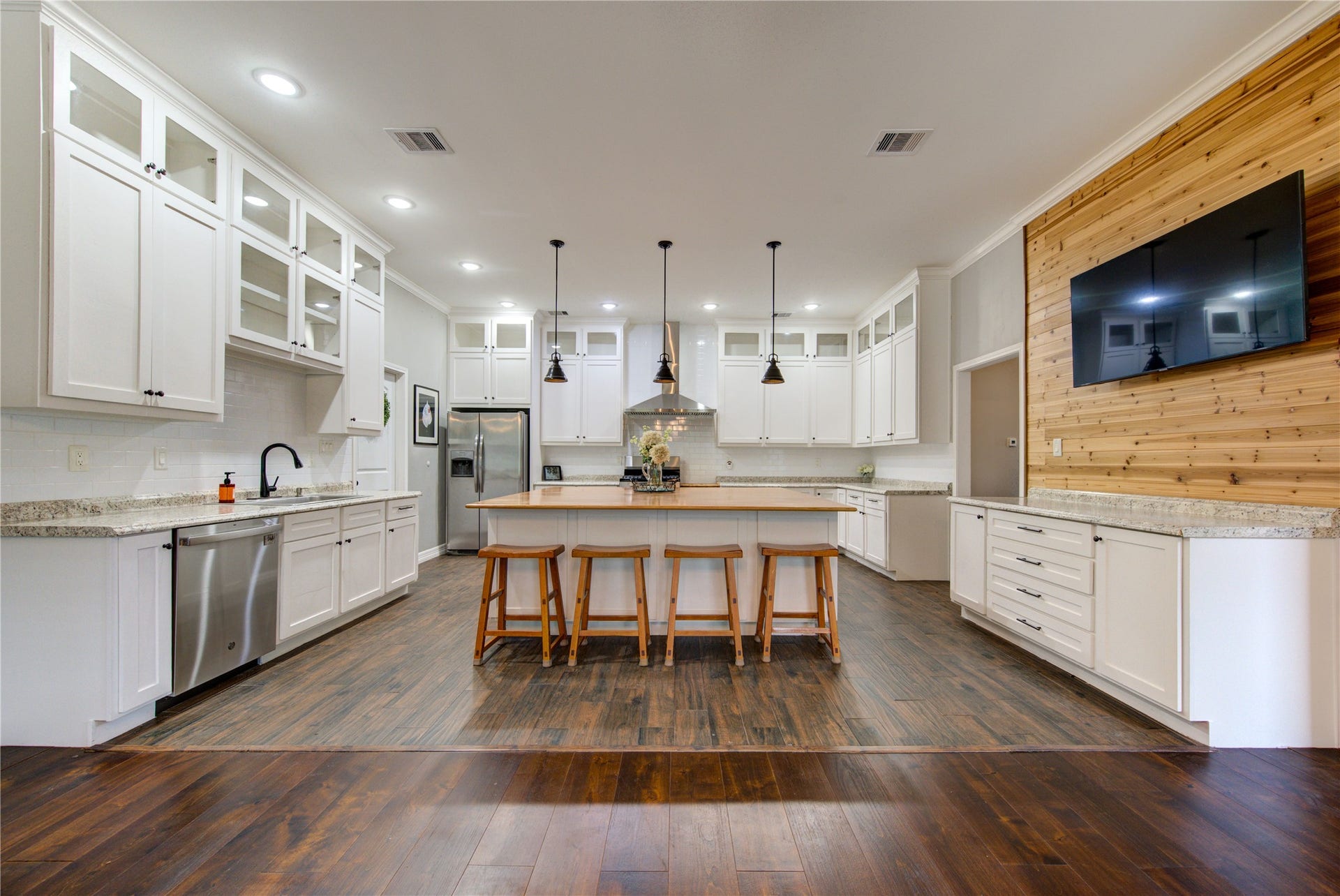 20531 Faye Street, Tomball, TX 77377 Chef-inspired kitchen featuring an oversized island, abundant cabinetry, and extensive counter space.