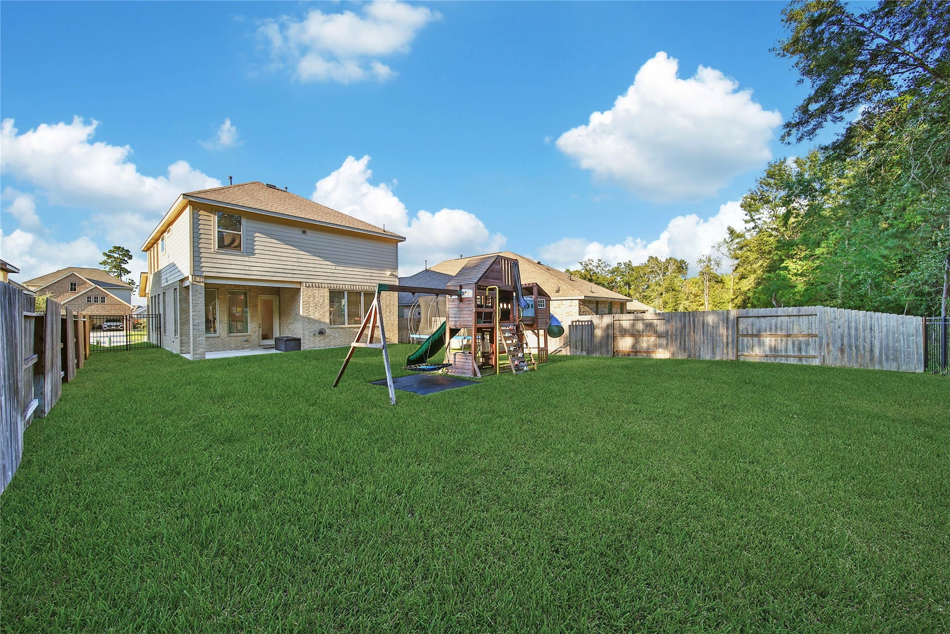 6048 Windward Falls Way, Porter, TX 77365 Rear property view.