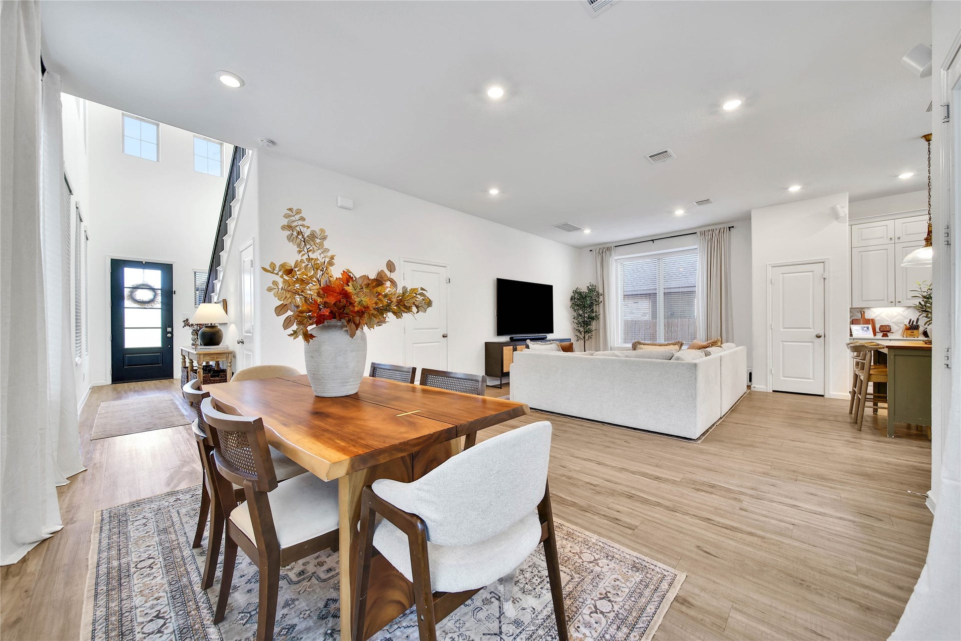 6048 Windward Falls Way, Porter, TX 77365 Very open and spacious floor plan. This view shows the dining room and vamily room.