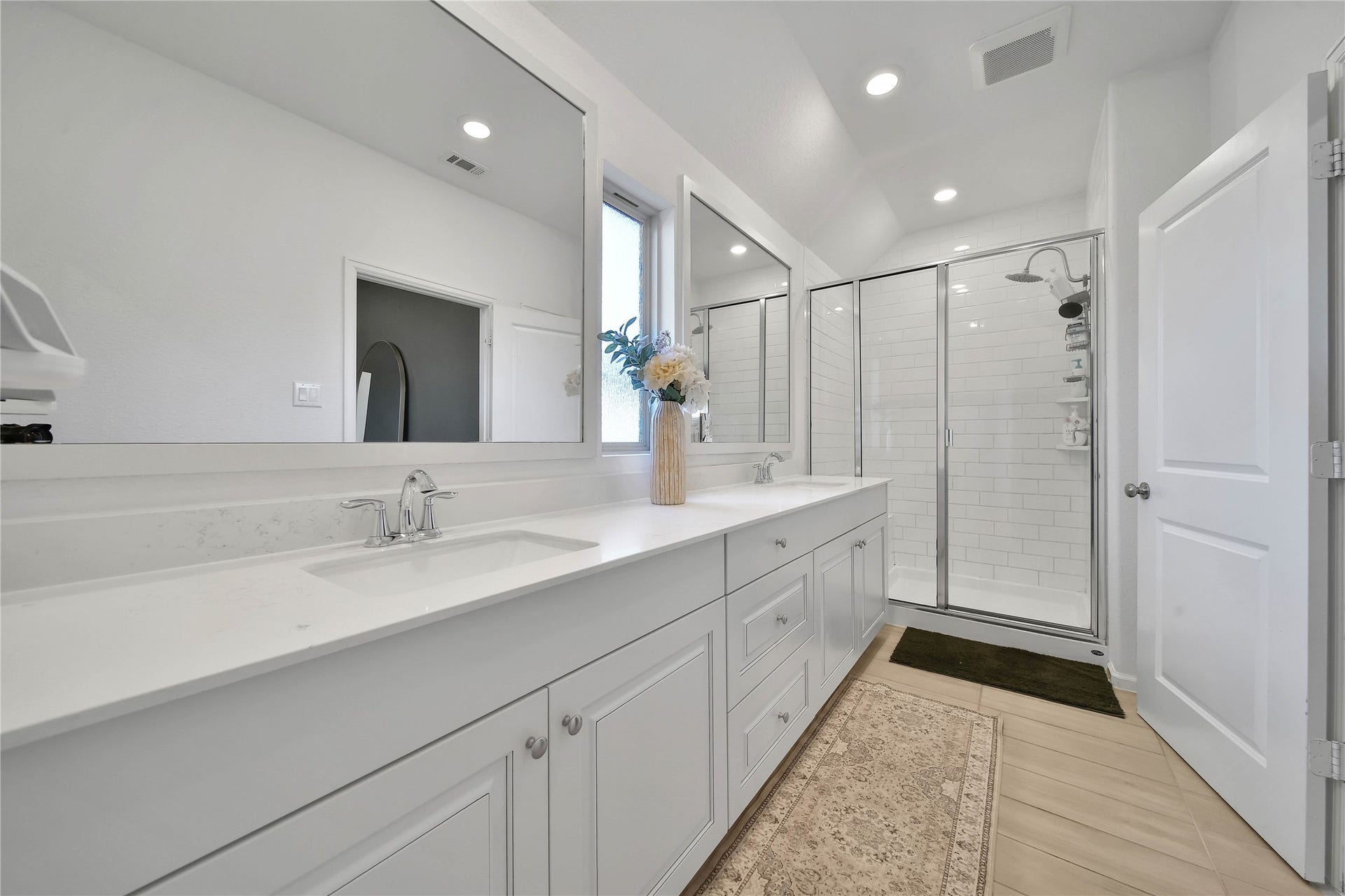 6048 Windward Falls Way, Porter, TX 77365 Primary bath features double sinks, spacious vanity with tons of storage, large walk in closet and oversized walk in shower.