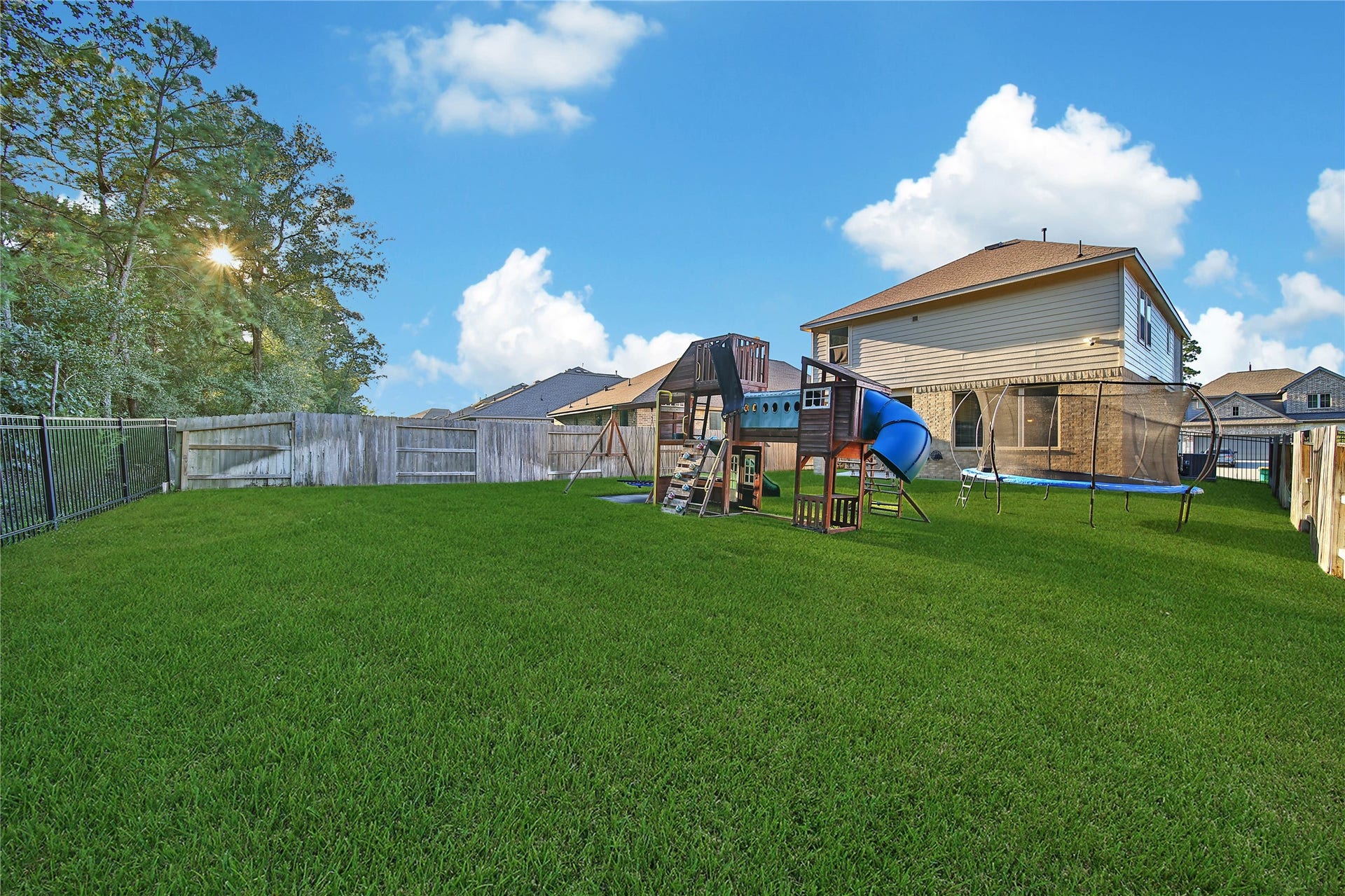 6048 Windward Falls Way, Porter, TX 77365 HUGE back yard! Wrought iron fence with NO BACK NEIGHBORS and the greenbelt is right behind the tree line!