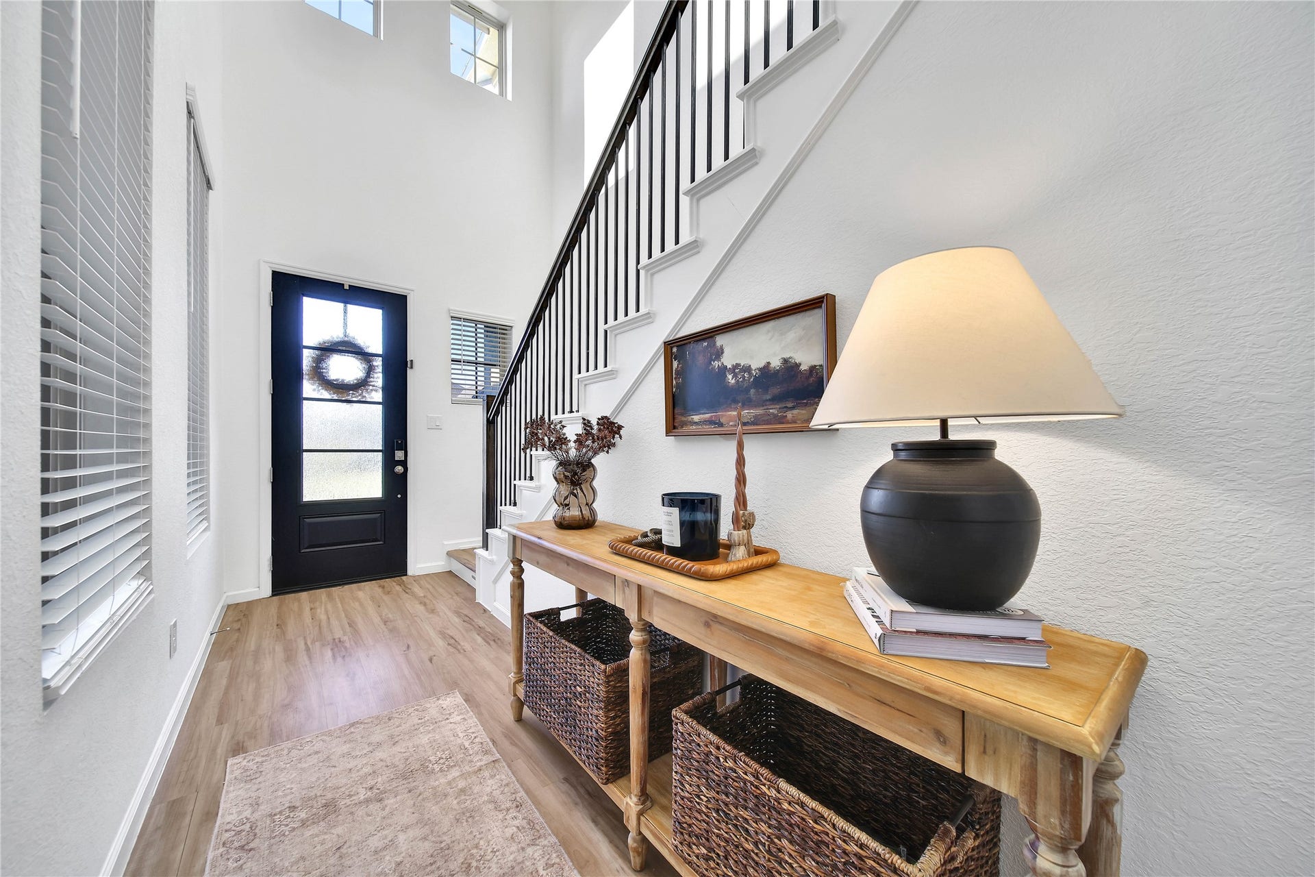 6048 Windward Falls Way, Porter, TX 77365 Come on in! This entry is very welcoming. High ceiling and multiple windows make it light and bright.