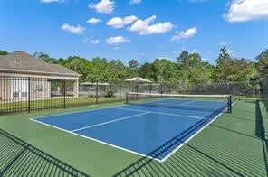 6048 Windward Falls Way, Porter, TX 77365 It's all about Pickleball these days! Your entire family will love it!