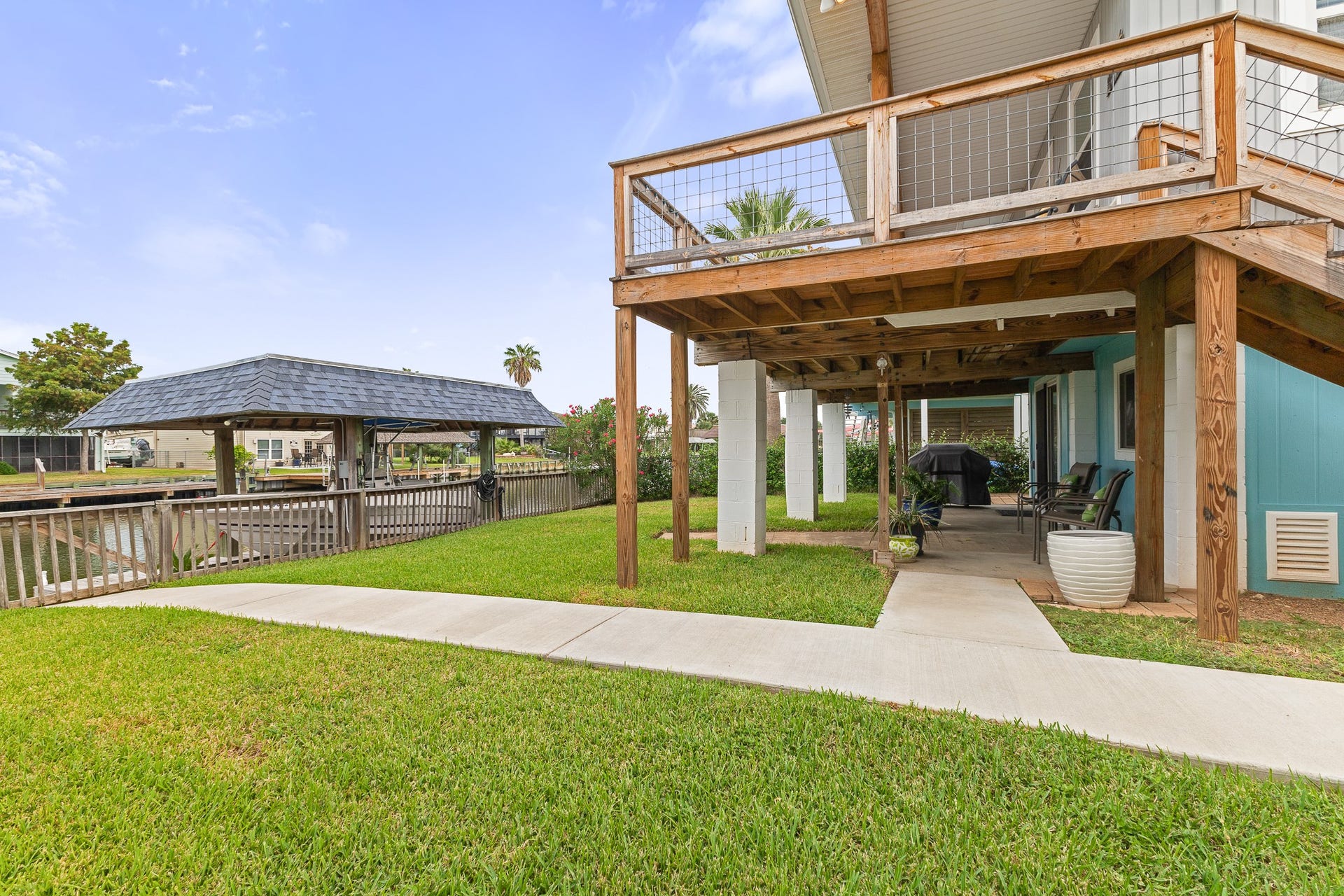 66 Tarpon Street, Bayou Vista, TX 77563 Large deck and waterfront yard