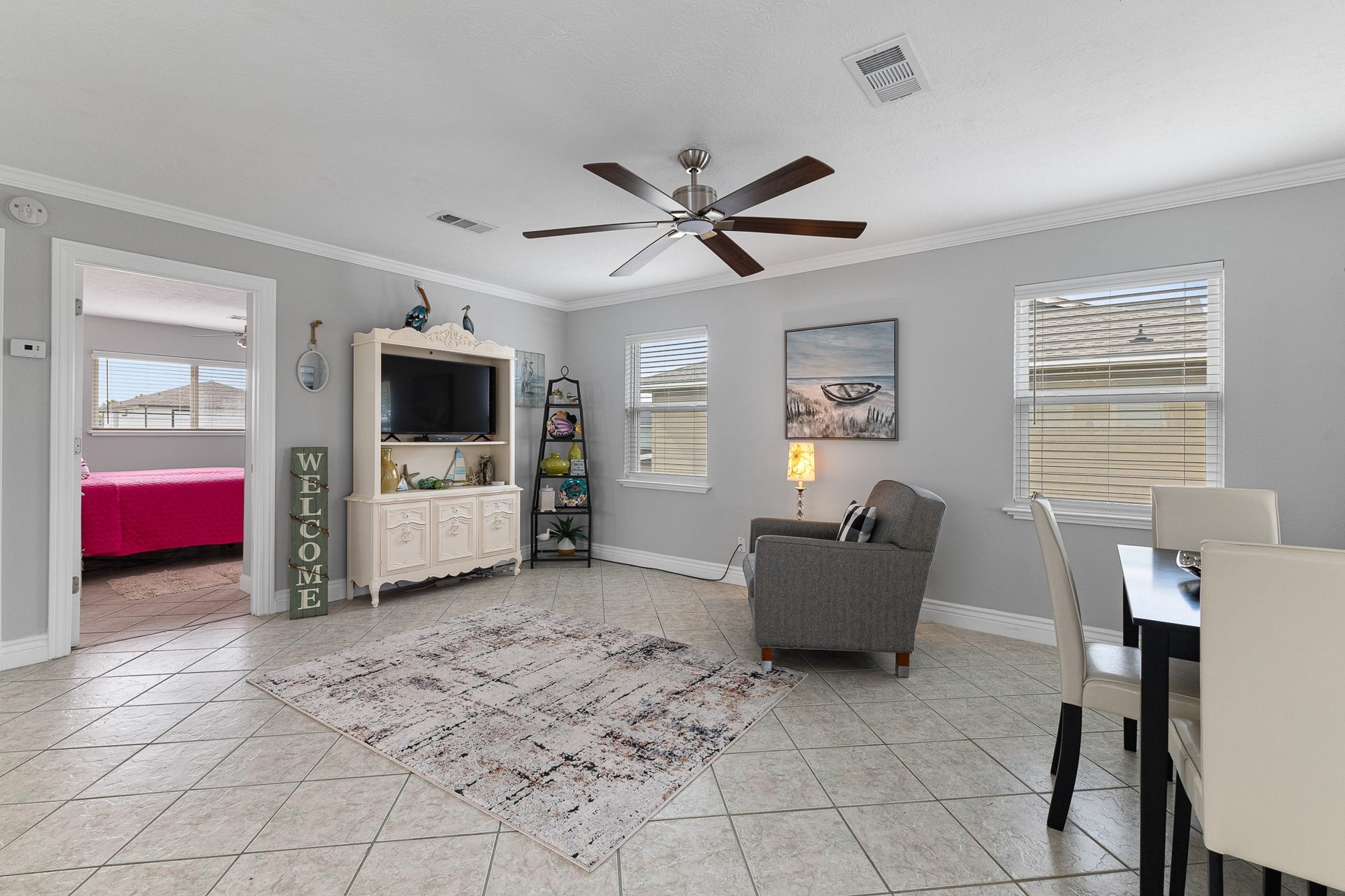 66 Tarpon Street, Bayou Vista, TX 77563 Bright, open living and dining area with easy-care tile flooring.