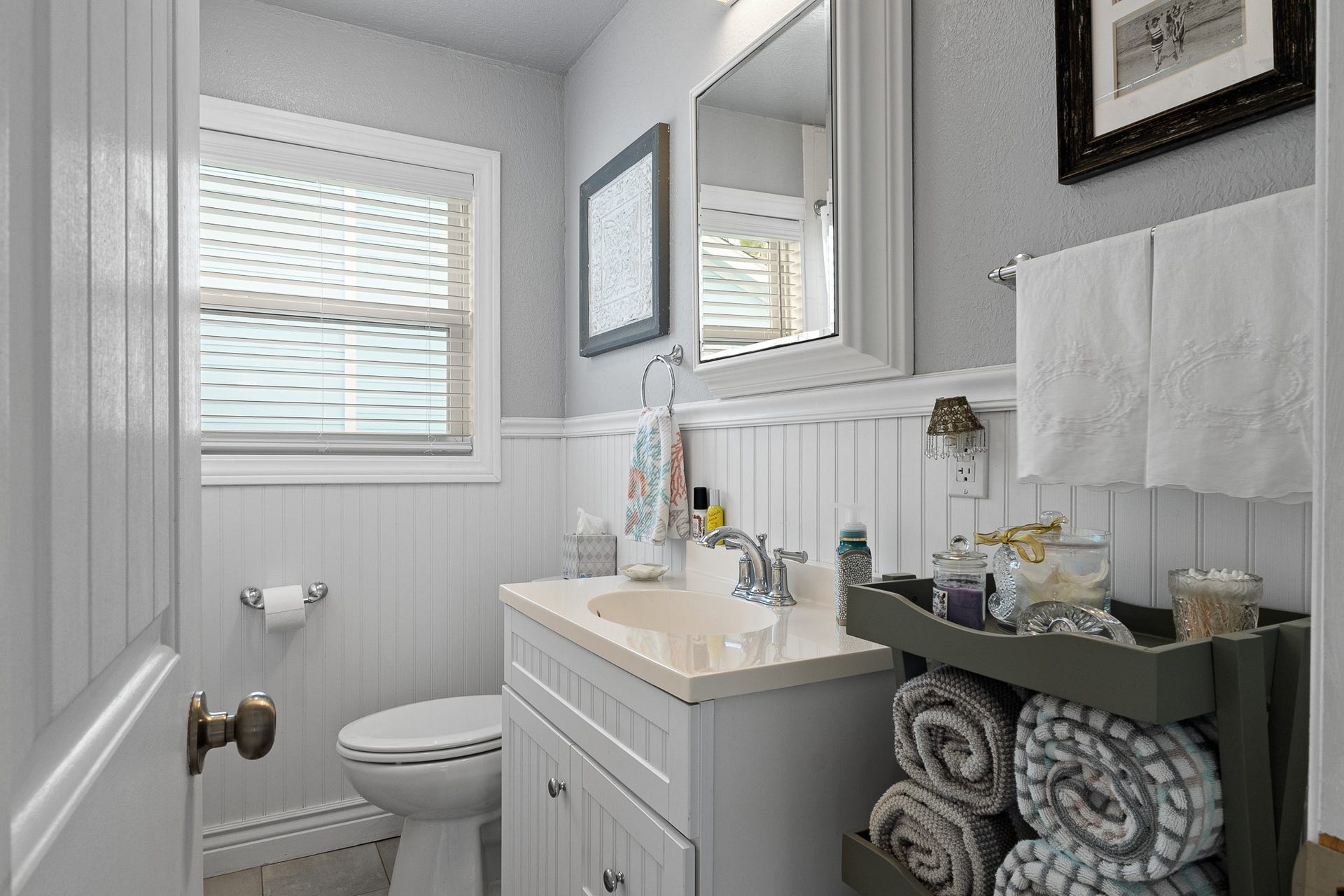 66 Tarpon Street, Bayou Vista, TX 77563 Full bathroom with tub/shower combination and window for natural light.